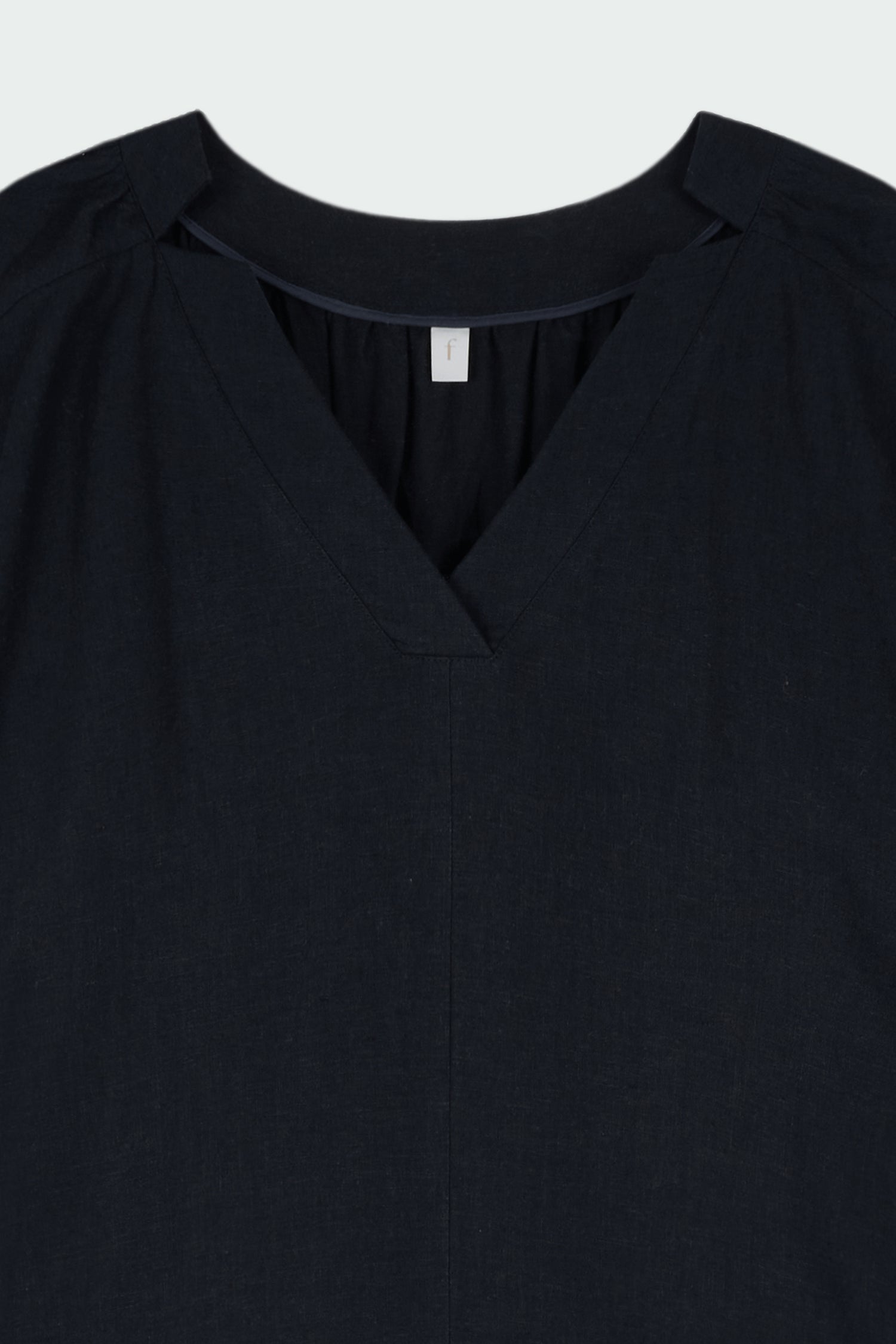 Charlotte Dress in navy, V-neck summer maxi dress in a lightweight linen-rayon blend with drop shoulders, hidden side pockets, raw edge hem, and a relaxed fit.