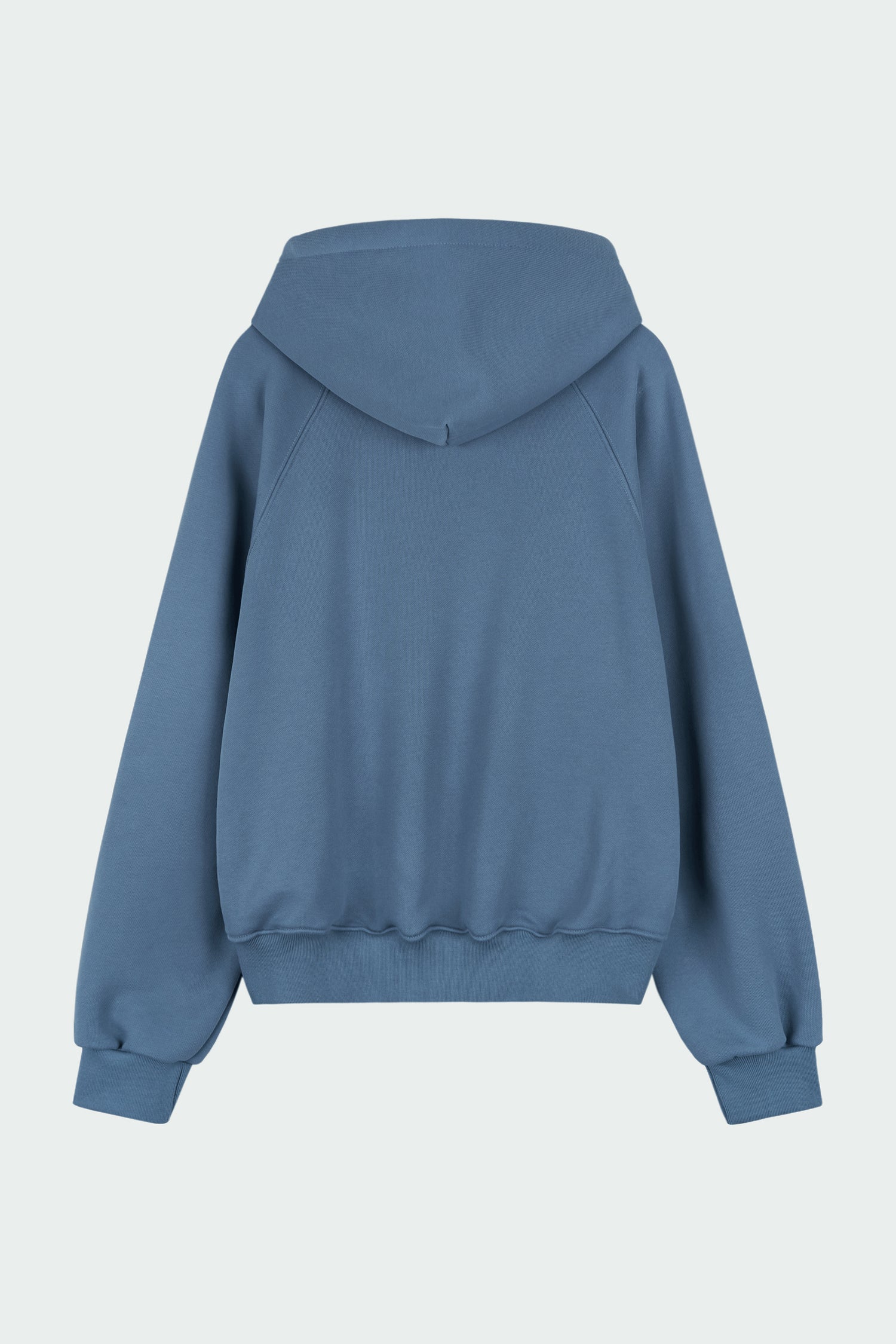Kaia Hoodie in indigo blue, oversized cotton French terry pullover with drawstring hood, raglan sleeves, kangaroo pocket, and ribbed trims.