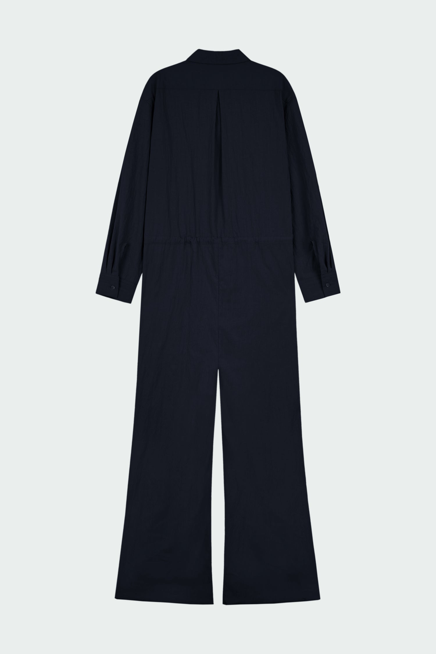 Saige Jumpsuit in navy, long-sleeve rayon blend jumpsuit with point collar, front button closure, drawstring waist, and patch pockets
