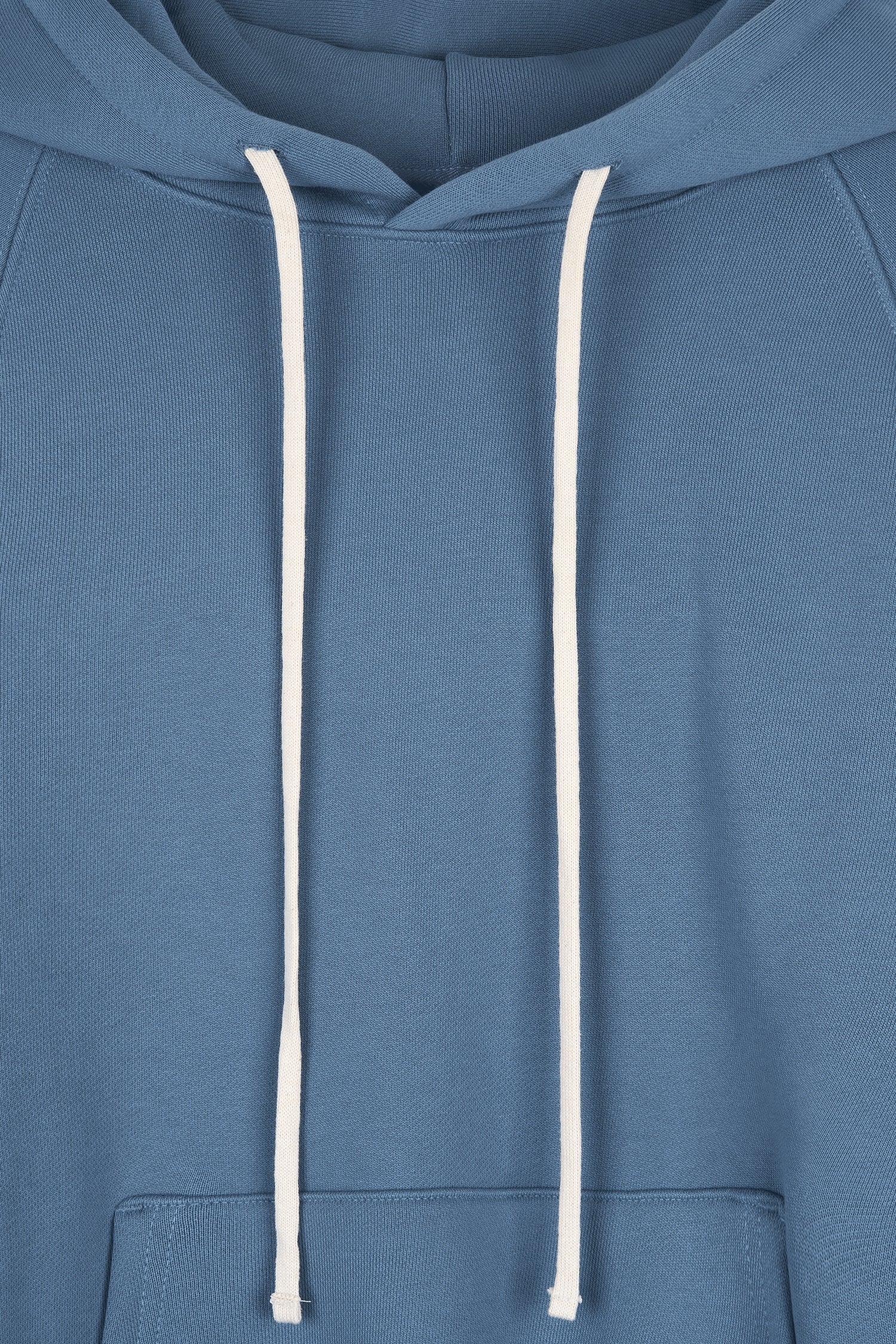 Kaia Hoodie in indigo blue, oversized cotton French terry pullover with drawstring hood, raglan sleeves, kangaroo pocket, and ribbed trims.