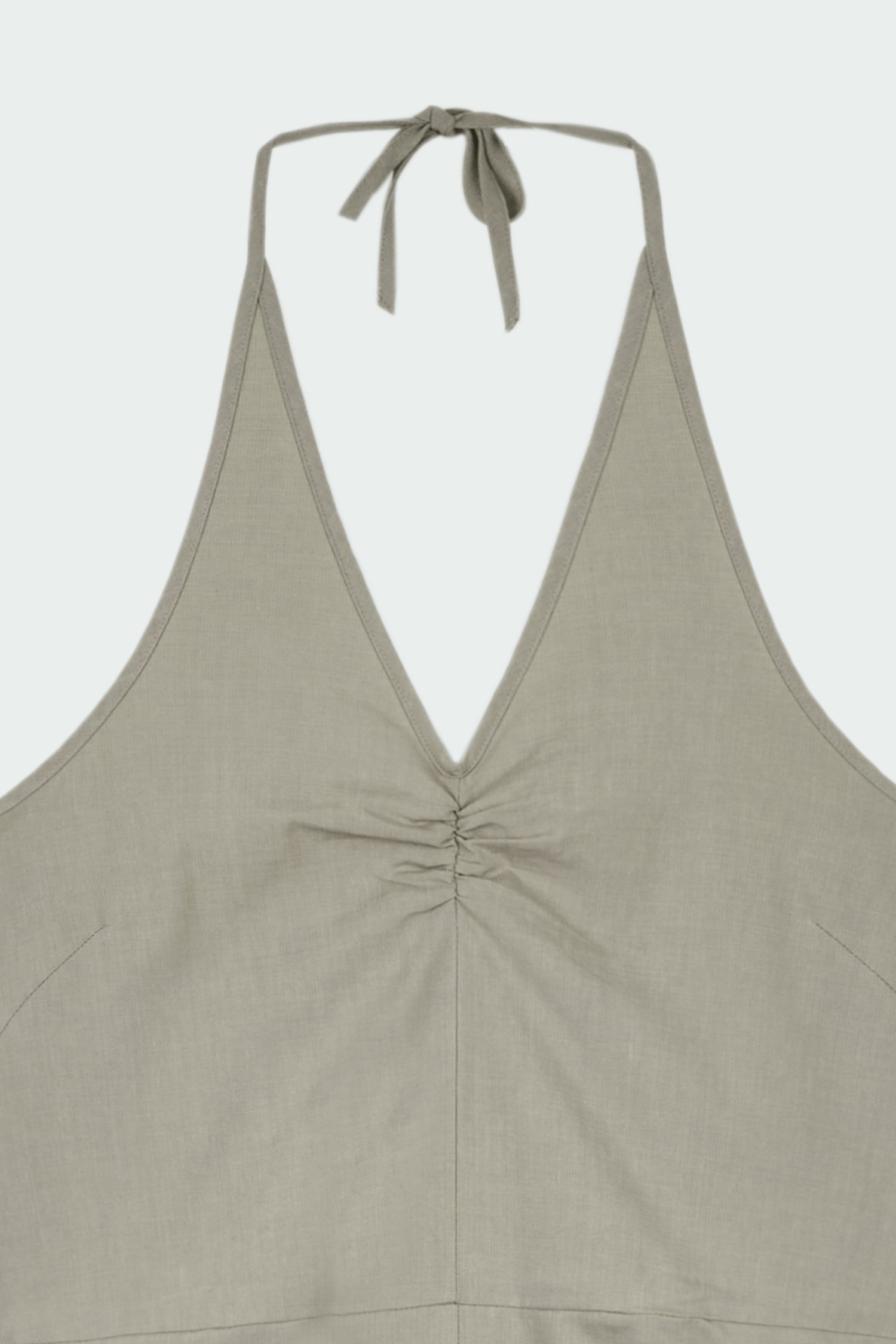 Daisy Jumpsuit in khaki gray, sleeveless linen blend jumpsuit with adjustable halterneck, open back, straight-leg silhouette, and relaxed fit.