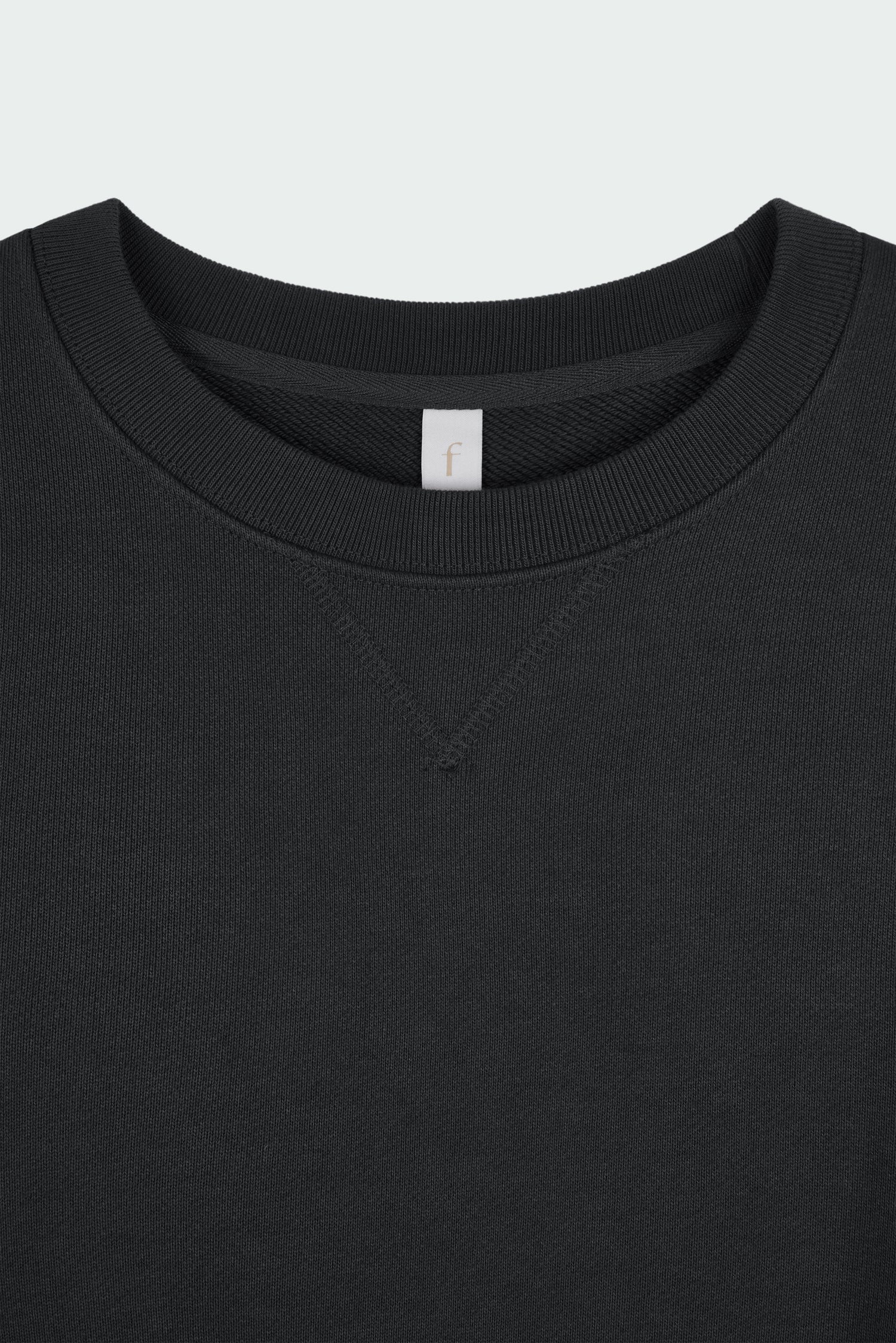 Willow Sweatshirt in ink black, a soft cotton French terry pullover with a crew neck, V-stitch detail, ribbed trims, and a relaxed fit, designed for everyday comfort