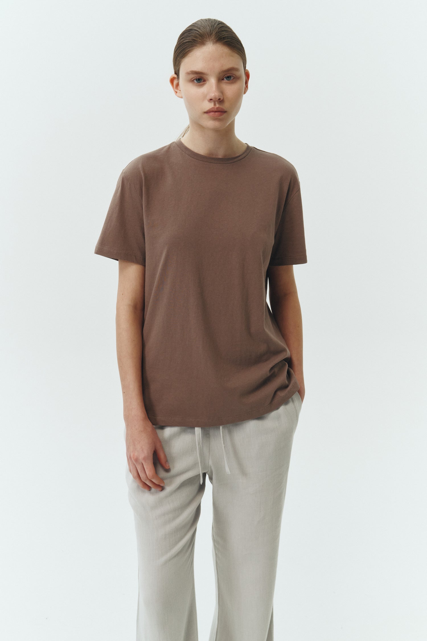 Lara T-shirt in brown, a relaxed-fit lightweight cotton tee with a crew neck and short sleeves for breathable daily wear.