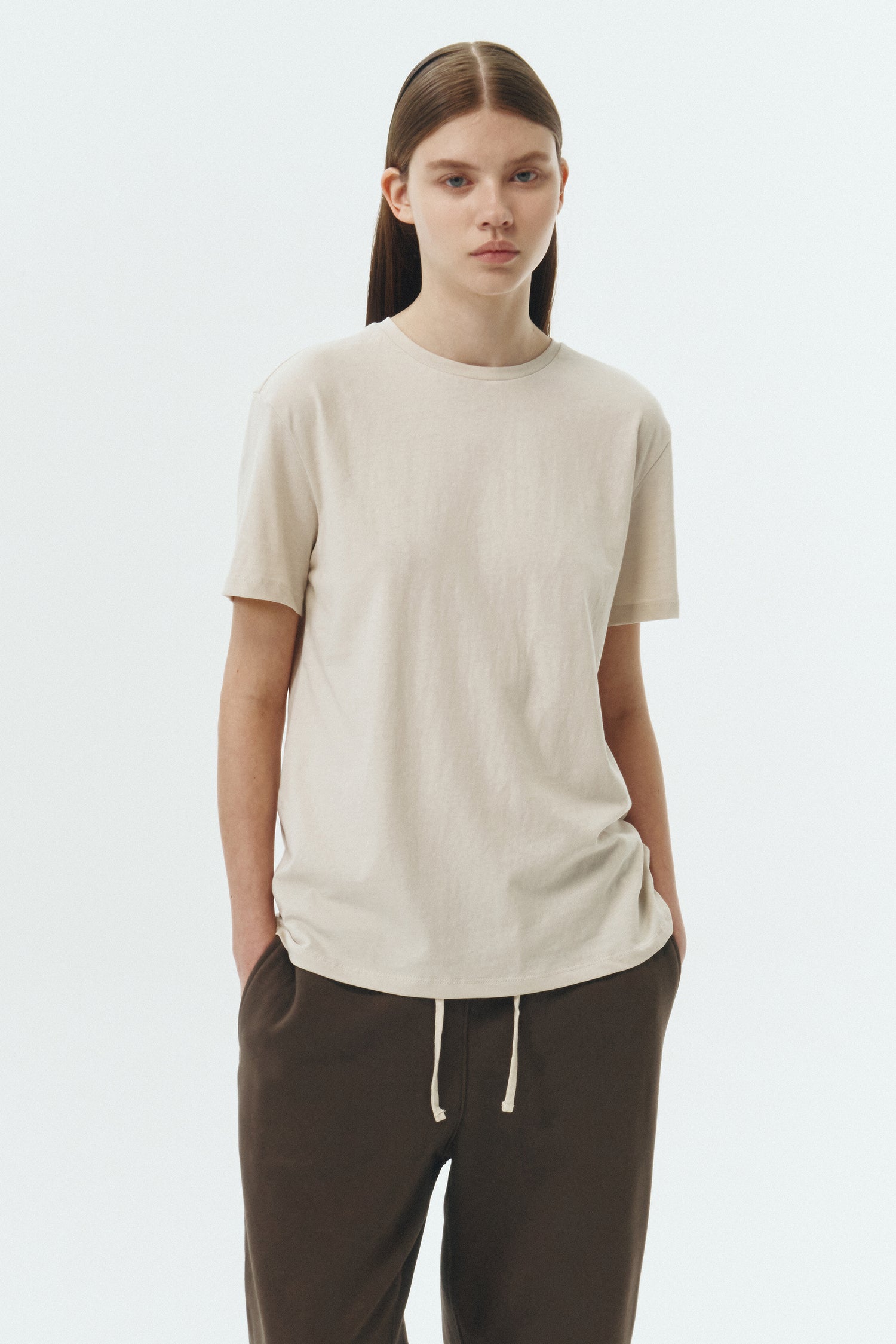 Lara T-shirt in natural, a relaxed-fit lightweight cotton tee with a crew neck and short sleeves for breathable daily wear.
