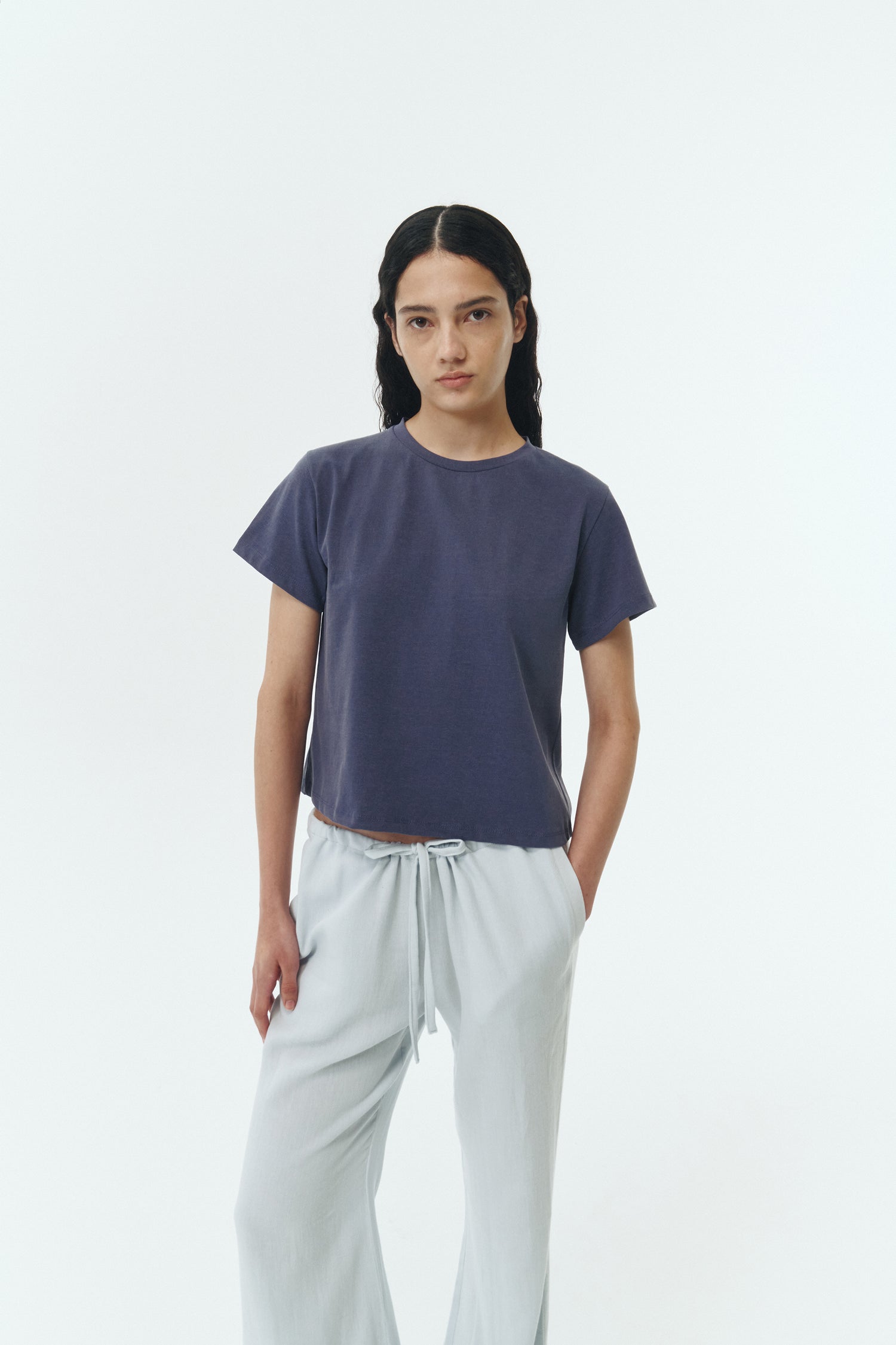 Chloe Pants in sky, lightweight cotton pants with a drawstring waist, side pockets, and a flared bottom, relaxed fit for effortless everyday wear