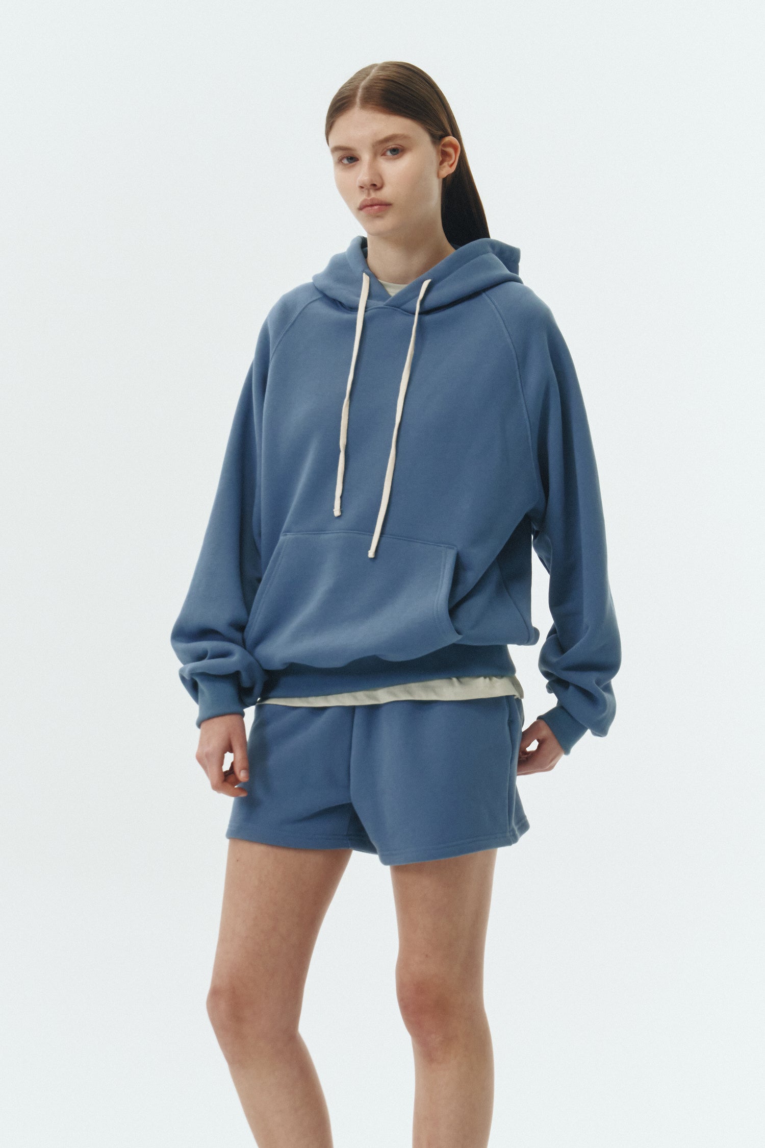 Kaia Shorts in indigo blue, mini-length cotton French terry shorts with an elasticated drawstring waist, side pockets, and back pocket, regular fit, part of a casual set