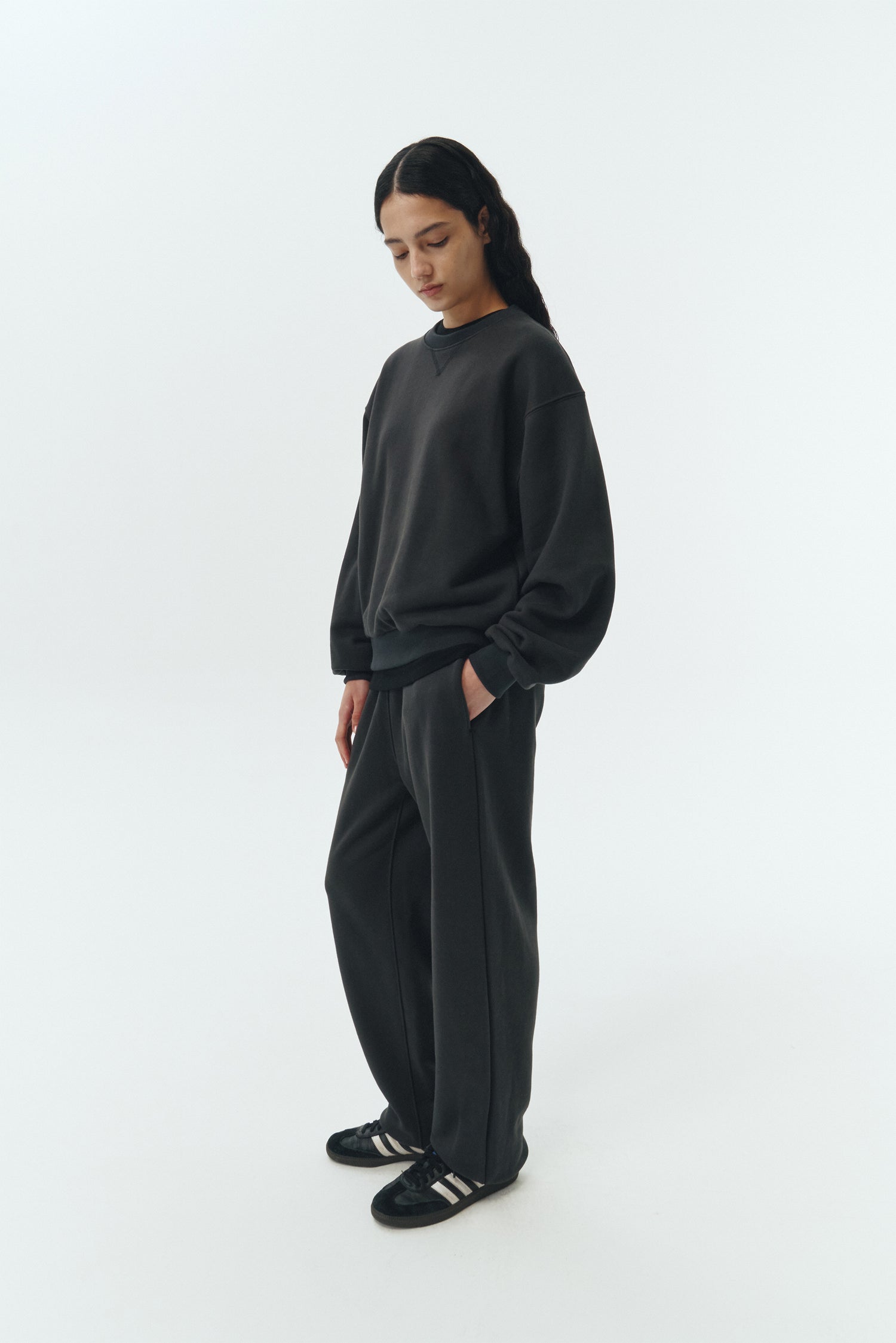 Willow Sweatpants in ink black, soft French terry cotton with drawstring waistband, side pockets, and elastic cuffs, regular fit, part of a set