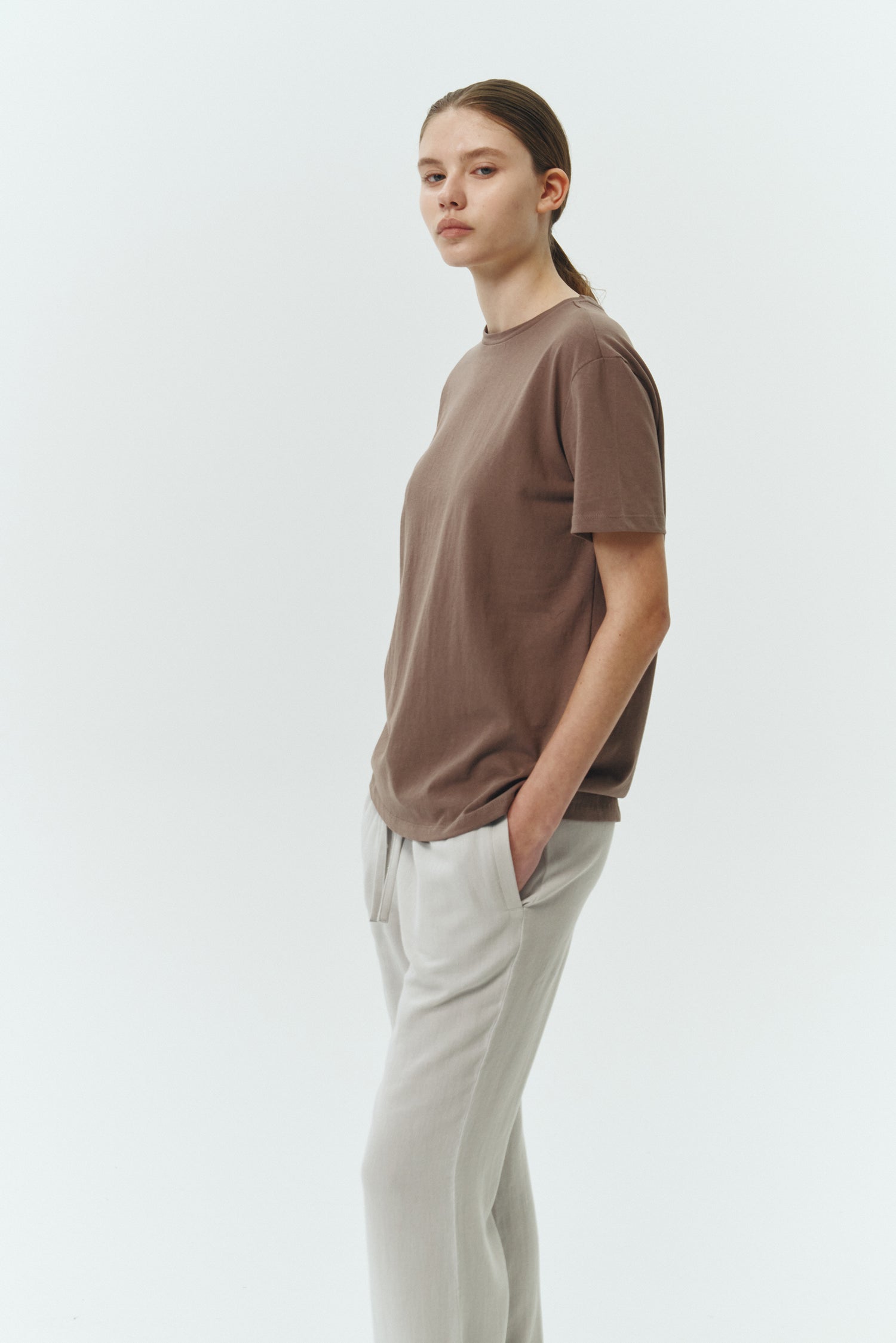 Lara T-shirt in brown, a relaxed-fit lightweight cotton tee with a crew neck and short sleeves for breathable daily wear.