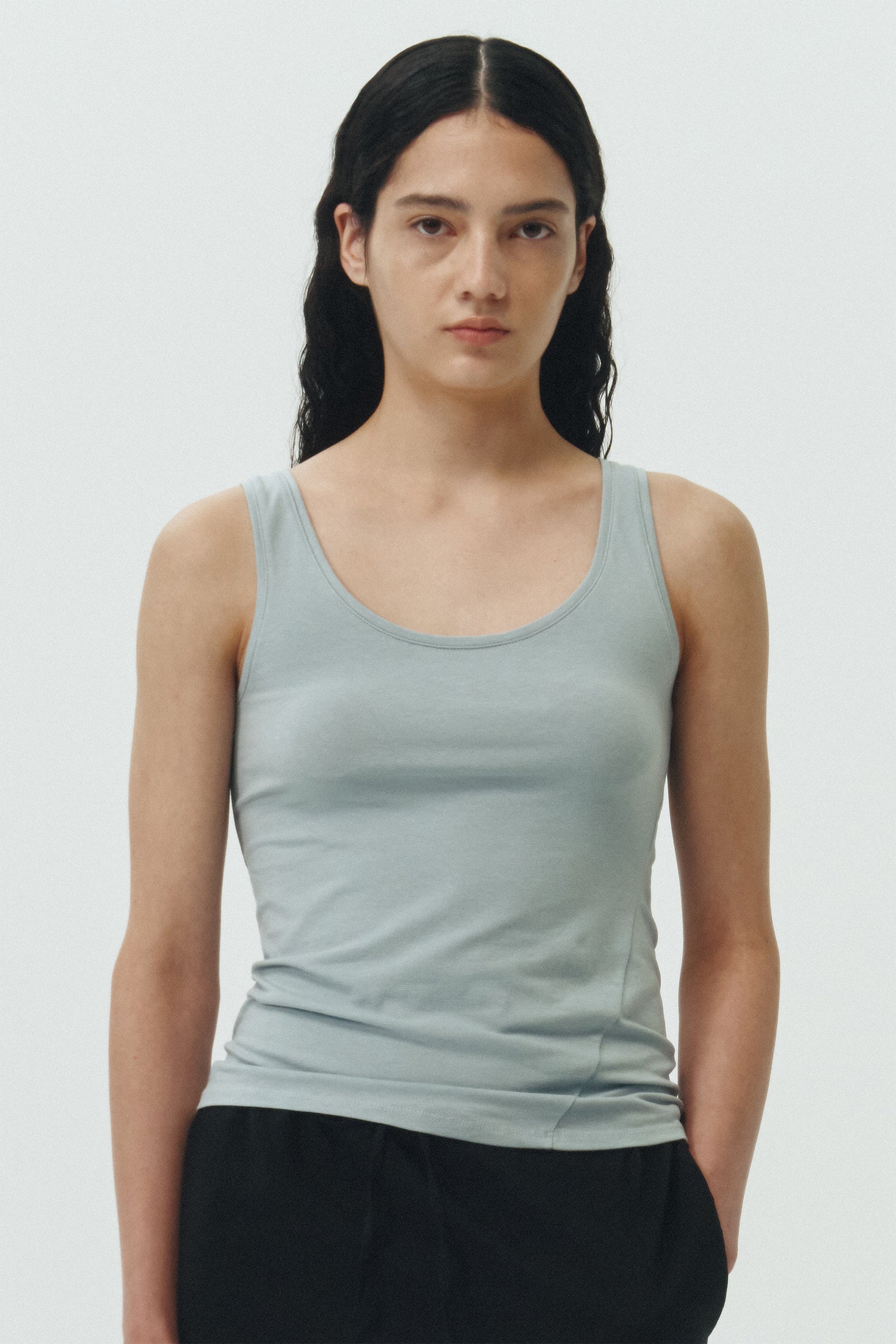 Zoe Tank Top in sky, slim-fit stretch cotton tank with scooped neckline and diagonal seam detail for a sleek and minimal silhouette.