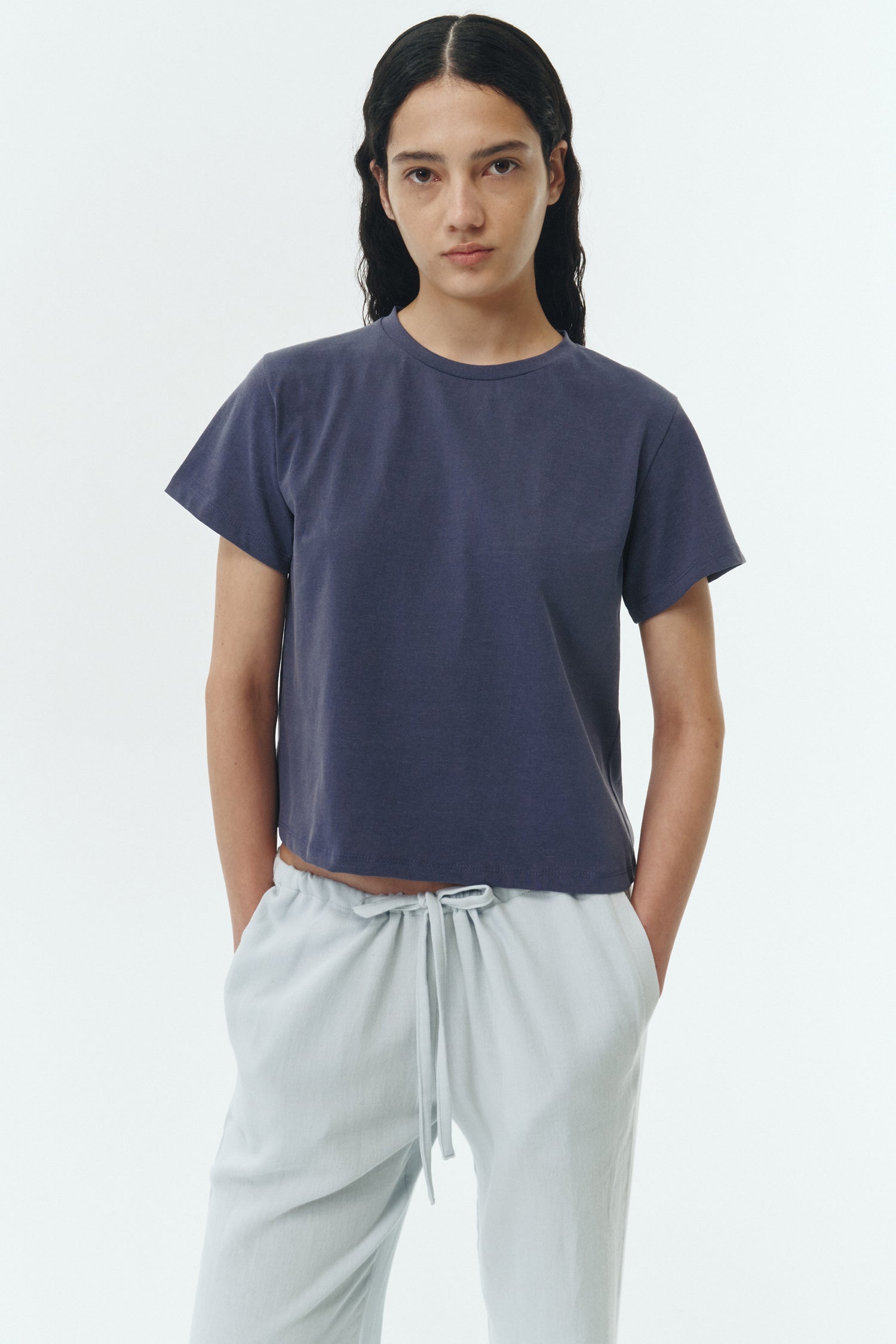 Chloe Pants in sky, lightweight cotton pants with a drawstring waist, side pockets, and a flared bottom, relaxed fit for effortless everyday wear