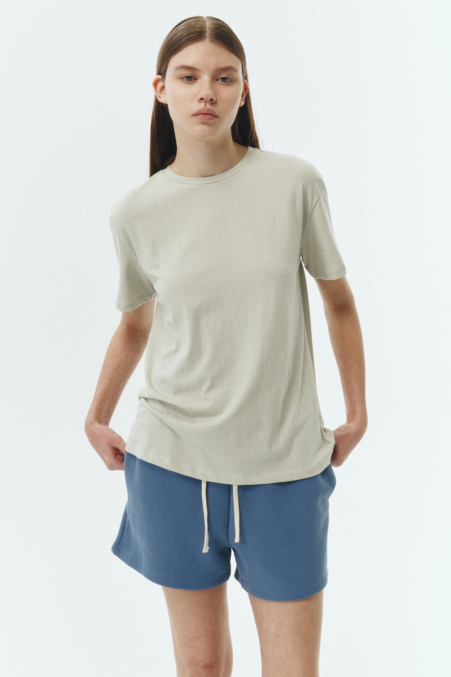 Kaia Shorts in indigo blue, mini-length cotton French terry shorts with an elasticated drawstring waist, side pockets, and back pocket, regular fit, part of a casual set
