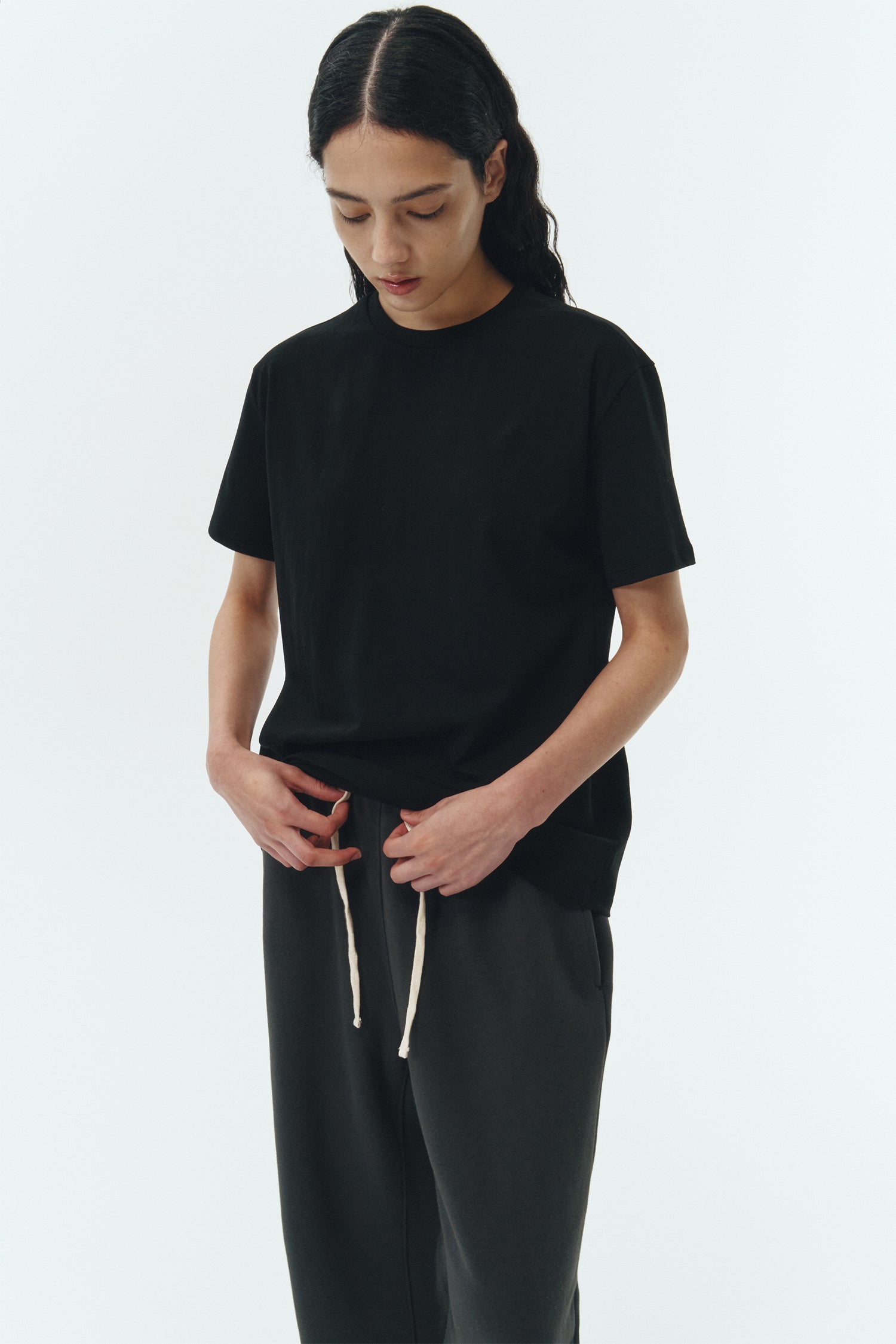 Willow Sweatpants in ink black, soft French terry cotton with drawstring waistband, side pockets, and elastic cuffs, regular fit, part of a set