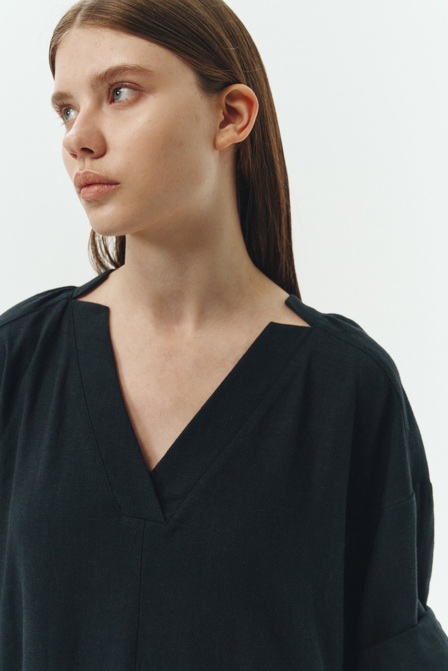 Charlotte Dress in navy, V-neck summer maxi dress in a lightweight linen-rayon blend with drop shoulders, hidden side pockets, raw edge hem, and a relaxed fit.