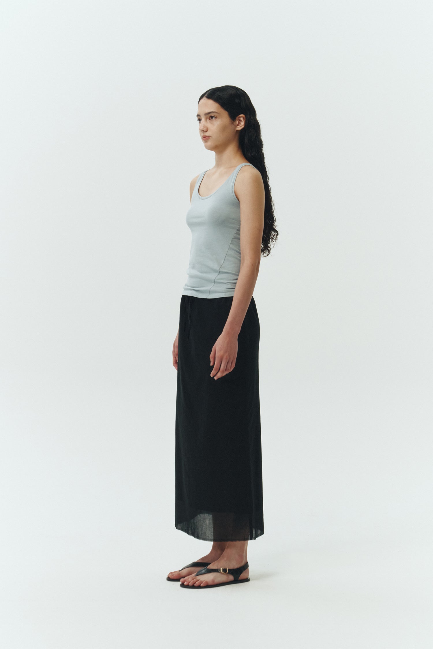 Zoe Tank Top in sky, slim-fit stretch cotton tank with scooped neckline and diagonal seam detail for a sleek and minimal silhouette.