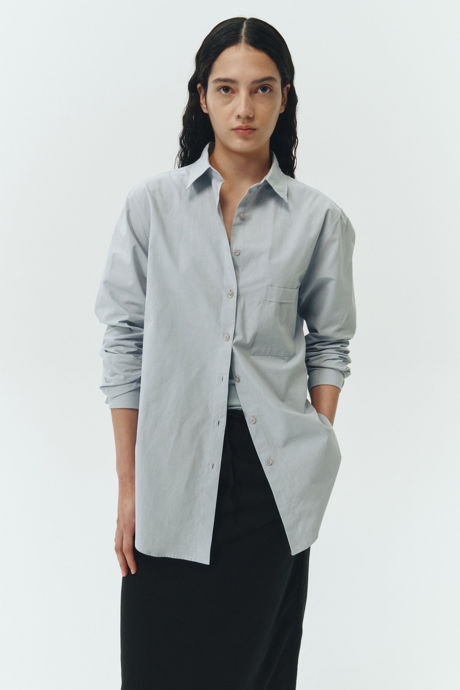 Isabella Shirt in sky, a lightweight cotton-poly blend button-up with chest pocket, back pleat, and buttoned cuffs, designed in a regular fit with a hip-length silhouette