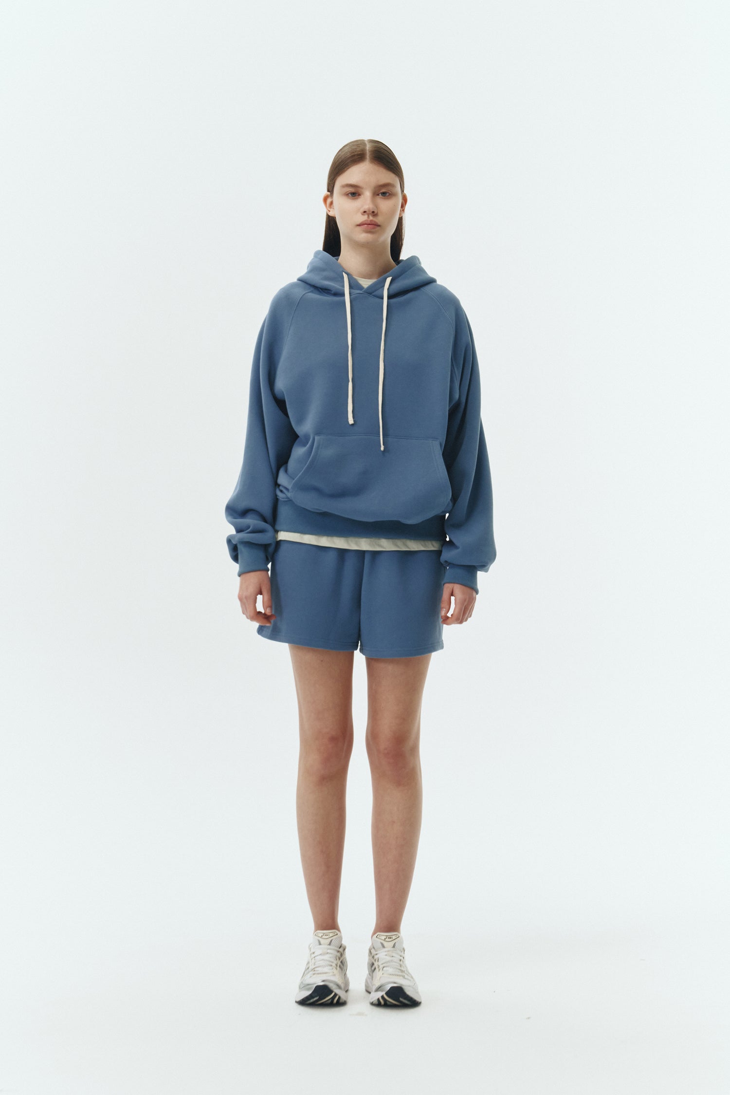 Kaia Shorts in indigo blue, mini-length cotton French terry shorts with an elasticated drawstring waist, side pockets, and back pocket, regular fit, part of a casual set