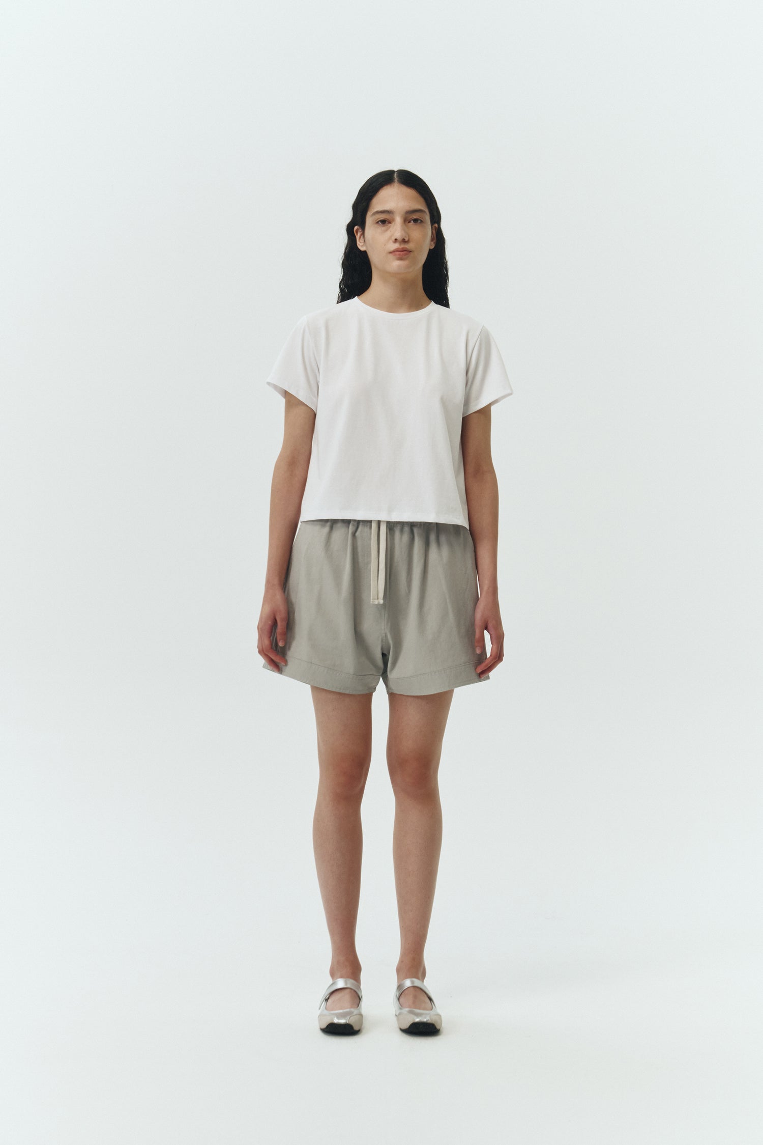 Ivy T-shirt in white, cropped short-sleeve tee in a lightweight cotton-poly blend with crew neck, regular fit, and clean silhouette.