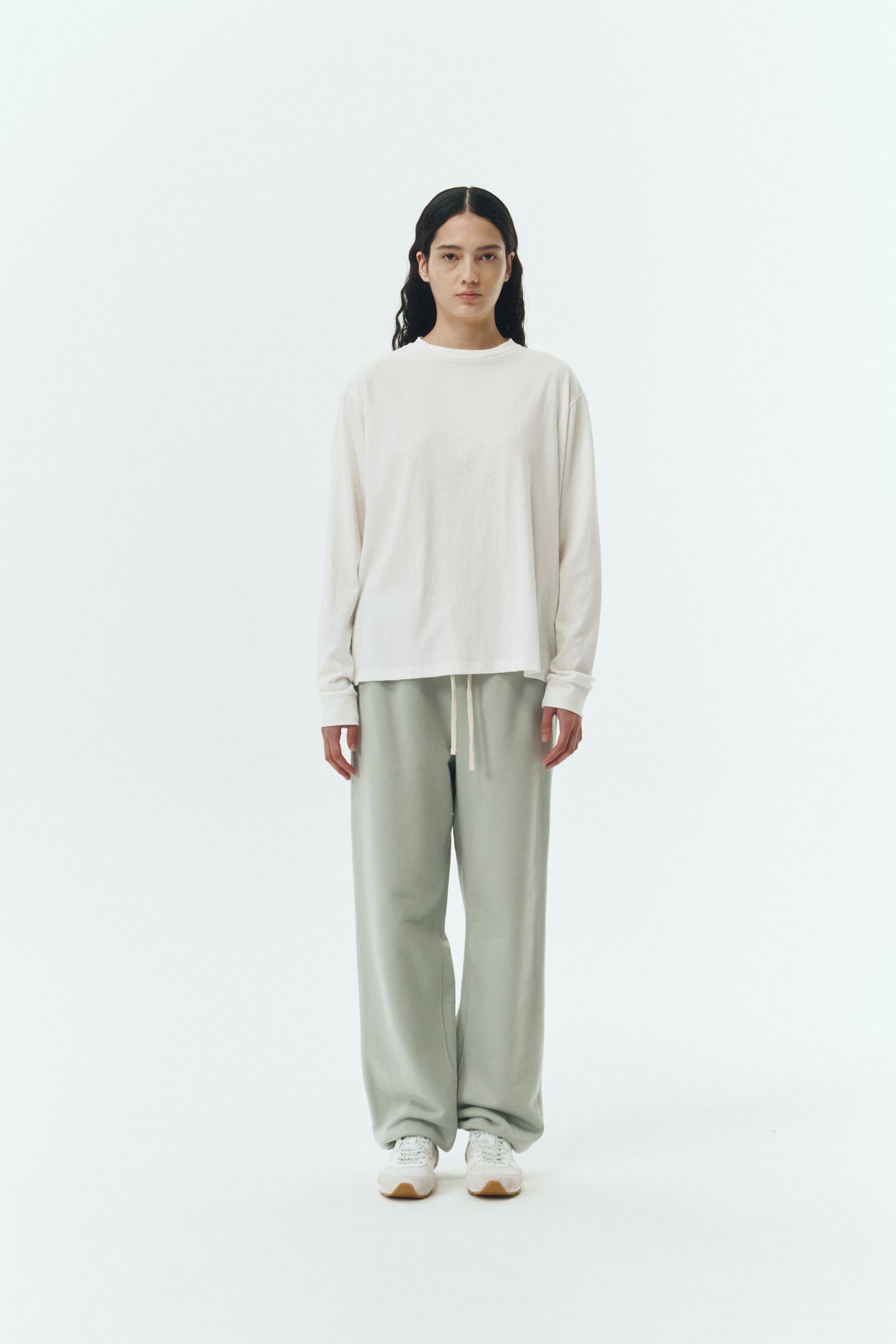 Lara Long-Sleeved T-Shirt in washed white, a lightweight cotton crew-neck tee with long sleeves and relaxed fit, ideal for everyday wear and seasonal layering