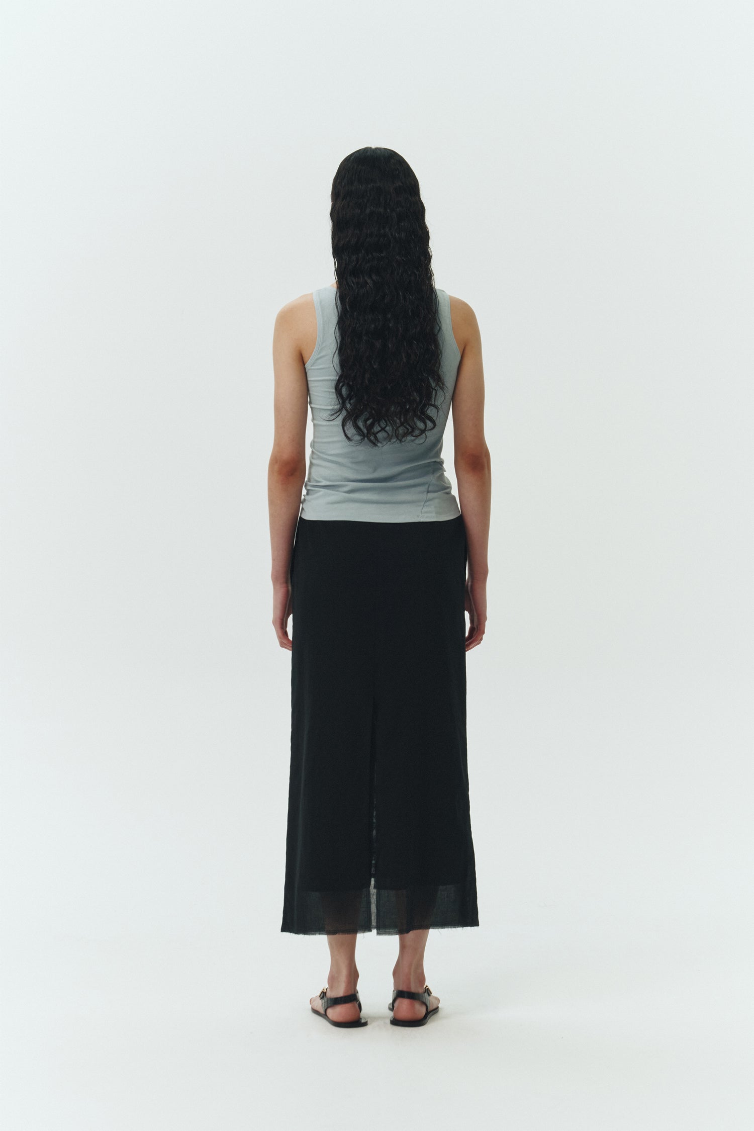 Zoe Tank Top in sky, slim-fit stretch cotton tank with scooped neckline and diagonal seam detail for a sleek and minimal silhouette.