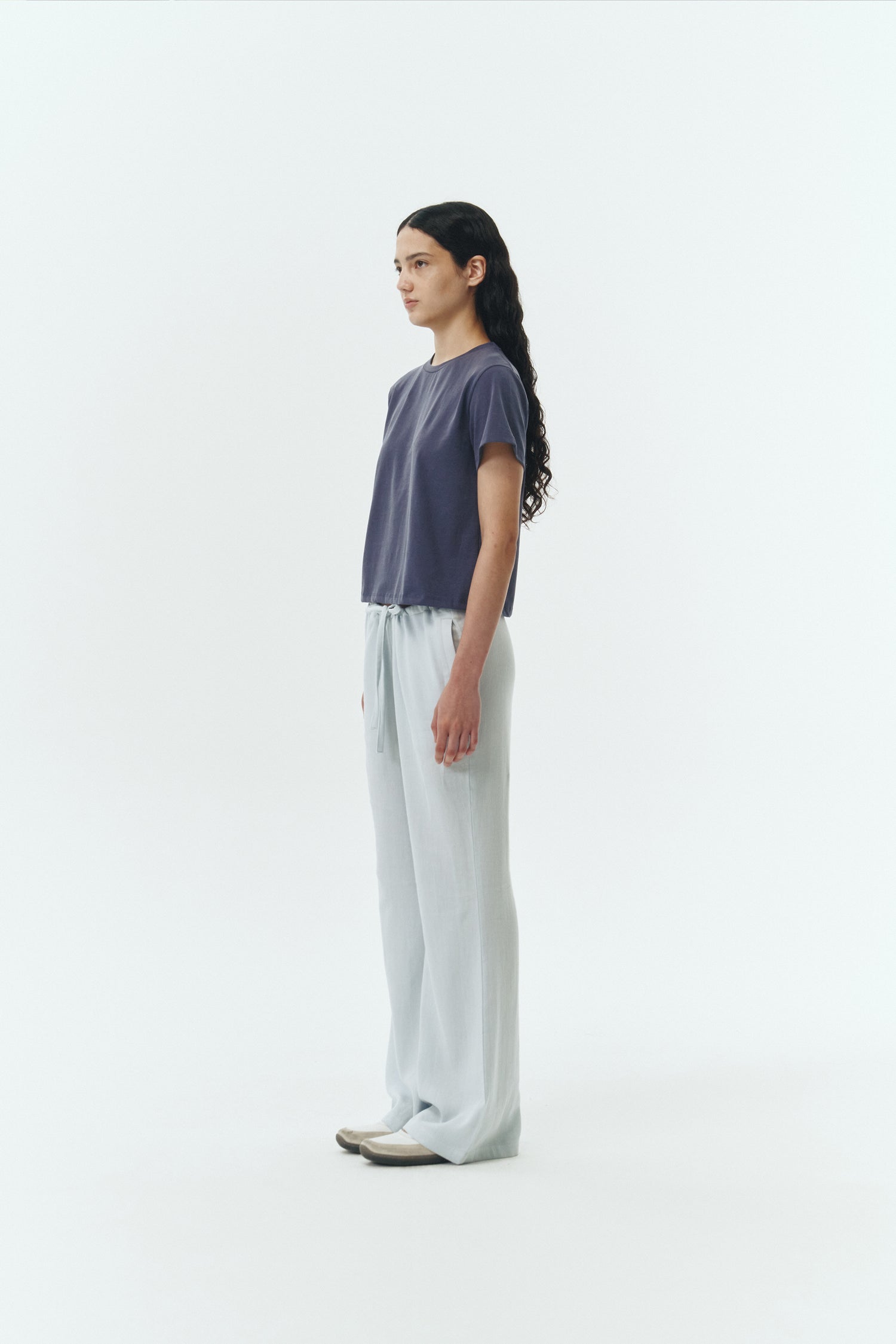 Chloe Pants in sky, lightweight cotton pants with a drawstring waist, side pockets, and a flared bottom, relaxed fit for effortless everyday wear