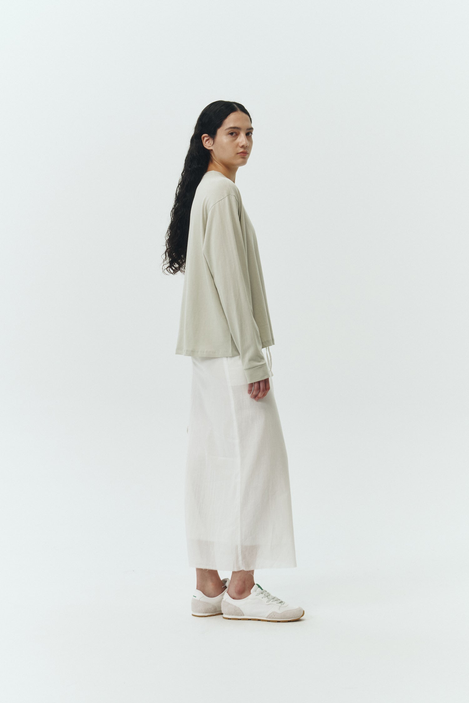 Lara Long-Sleeved T-Shirt in forest, a lightweight cotton crew-neck tee with long sleeves and relaxed fit, ideal for everyday wear and seasonal layering
