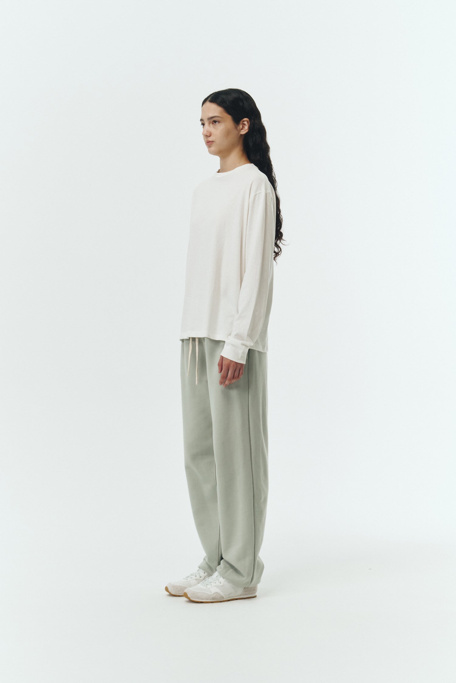 Lara Long-Sleeved T-Shirt in washed white, a lightweight cotton crew-neck tee with long sleeves and relaxed fit, ideal for everyday wear and seasonal layering