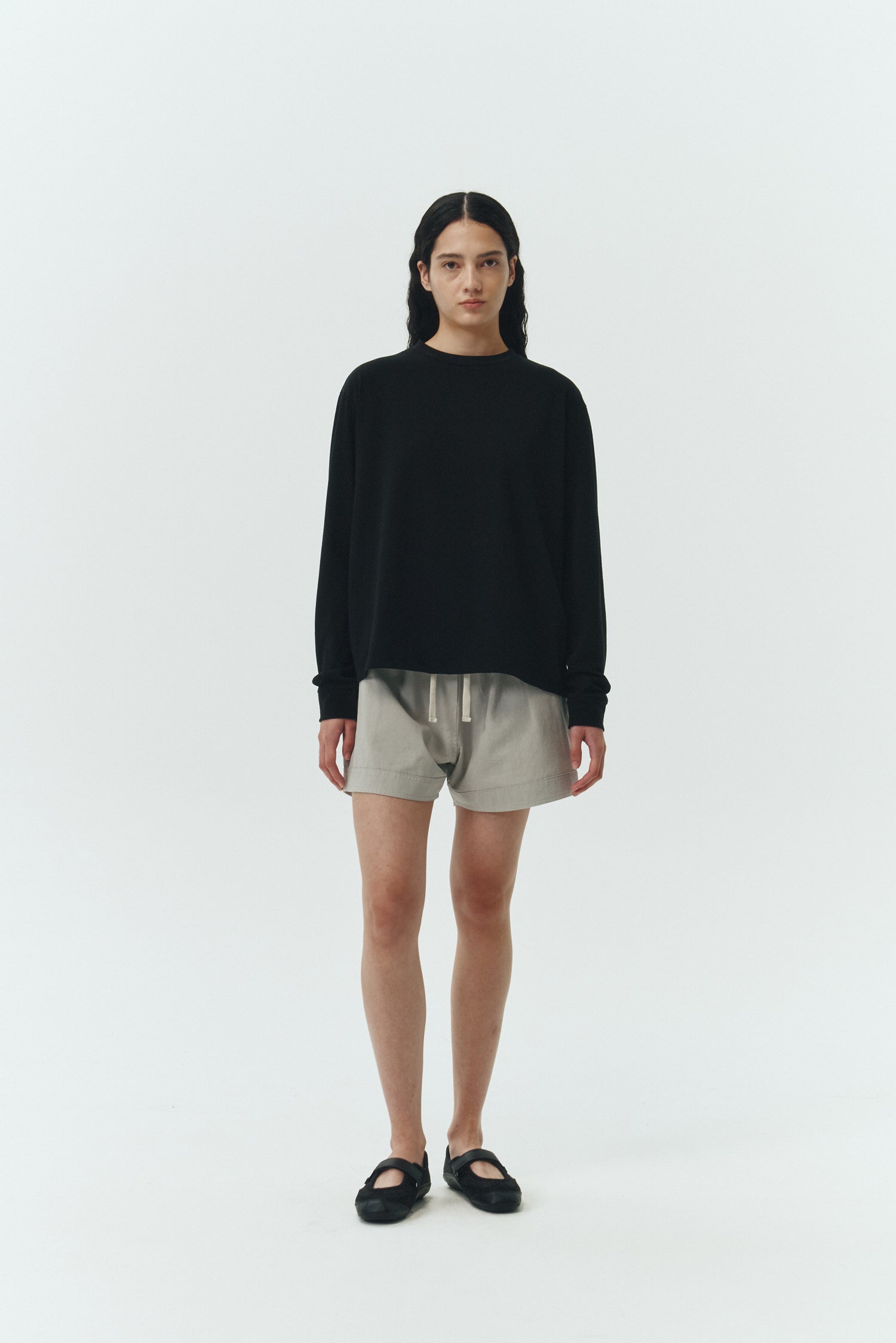 Lara Long-sleeved T-shirt in black, a relaxed-fit lightweight cotton tee with a crew neck and long sleeves for breathable daily wear.