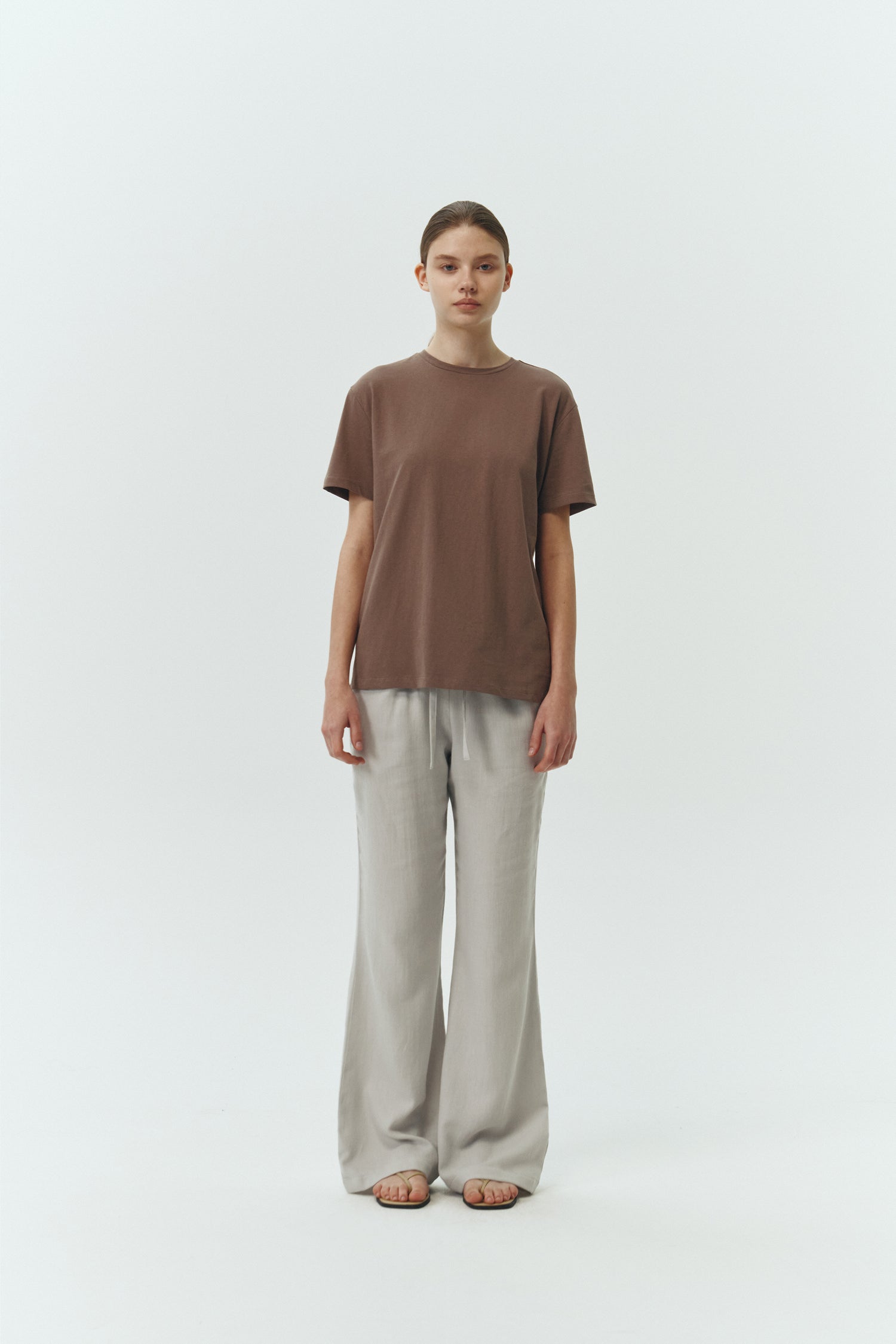 Lara T-shirt in brown, a relaxed-fit lightweight cotton tee with a crew neck and short sleeves for breathable daily wear.