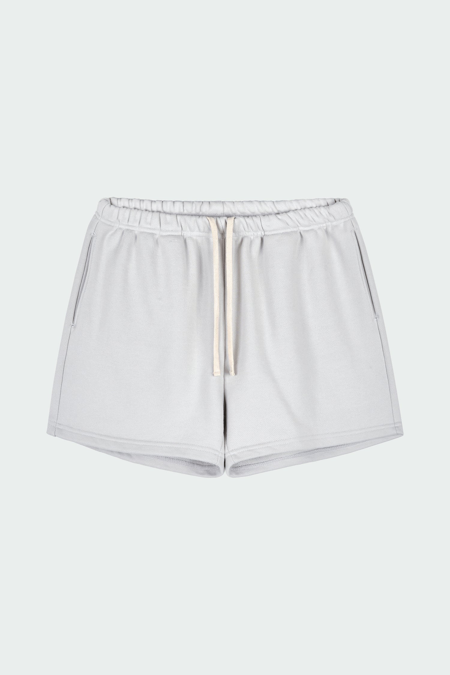 Kaia Shorts in dune, mini-length cotton French terry shorts with an elasticated drawstring waist, side pockets, and back pocket, regular fit, part of a casual set