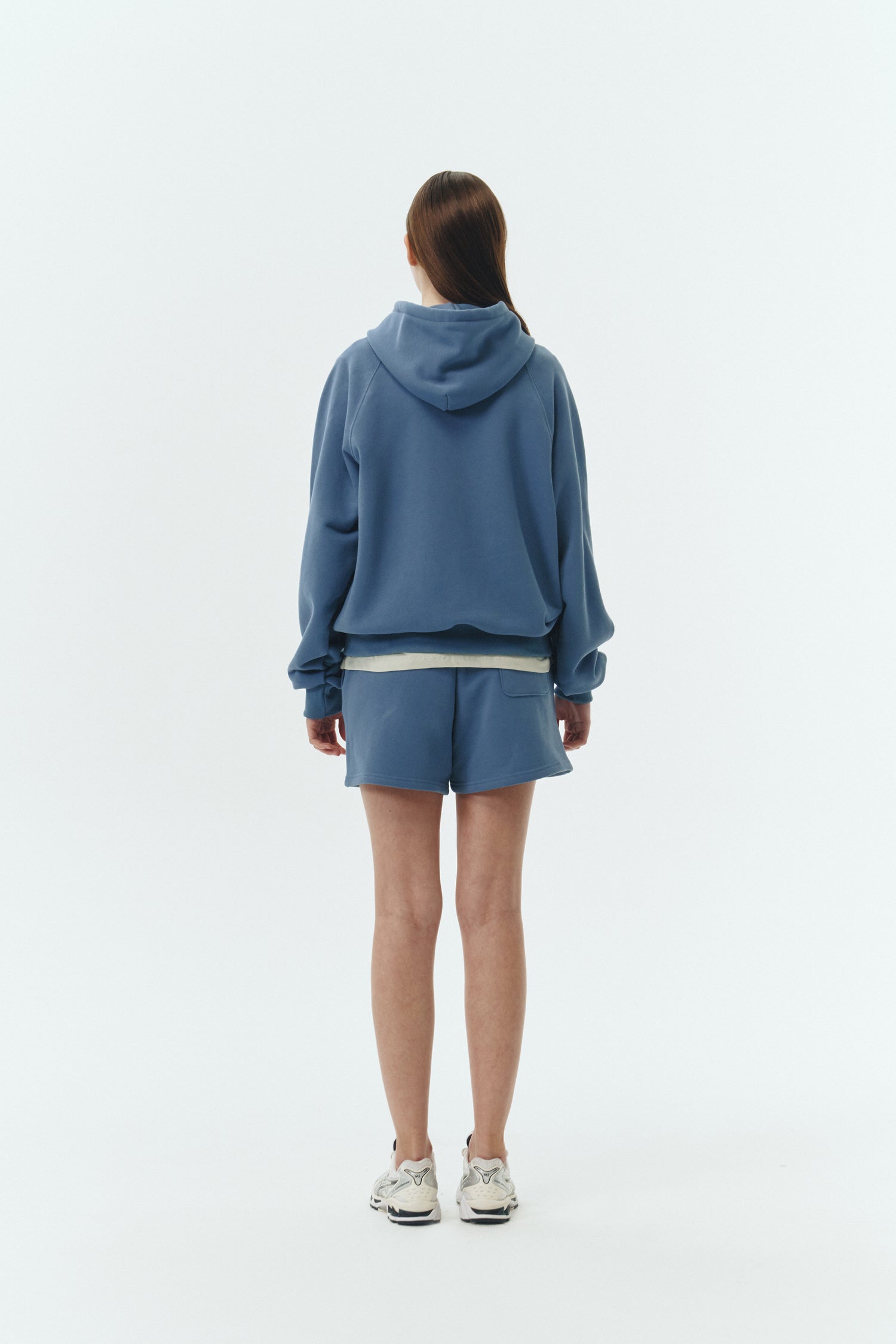Kaia Shorts in indigo blue, mini-length cotton French terry shorts with an elasticated drawstring waist, side pockets, and back pocket, regular fit, part of a casual set
