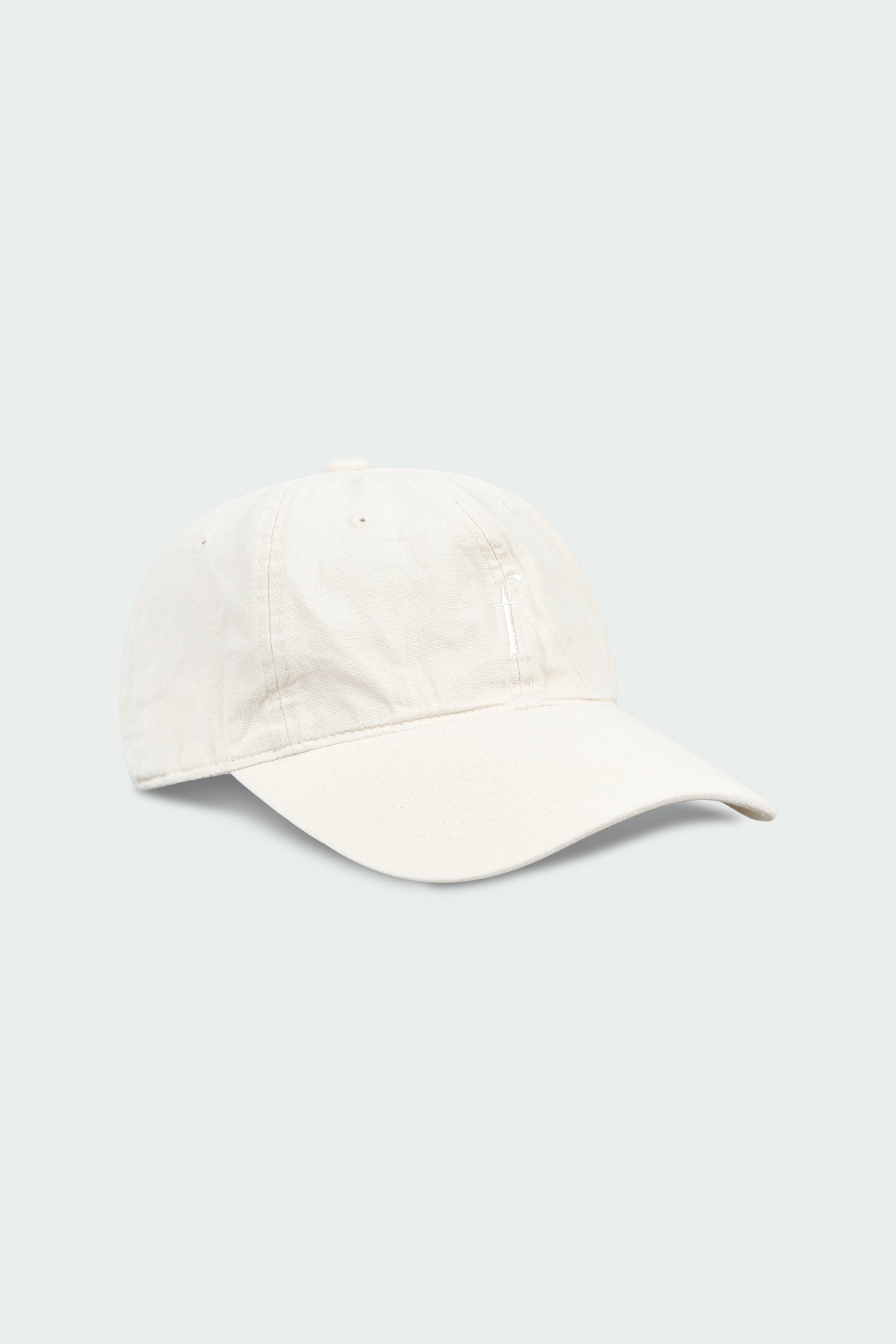 Steva Oxford Cap in cream, made from soft washed cotton with a front embroidered logo and adjustable buckle strap, designed for a casual everyday look