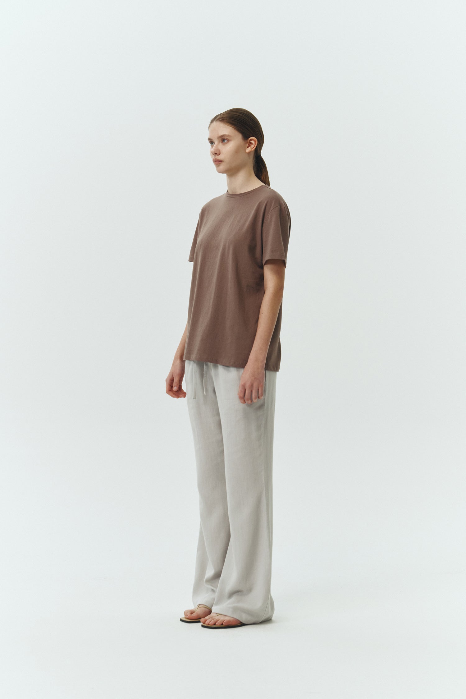 Lara T-shirt in brown, a relaxed-fit lightweight cotton tee with a crew neck and short sleeves for breathable daily wear.