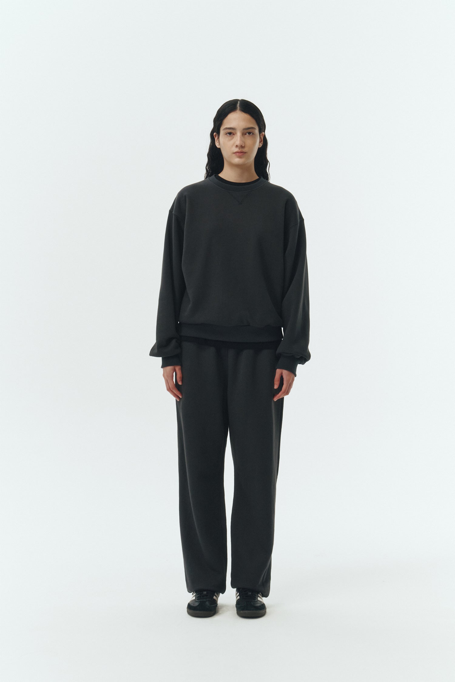 Willow Sweatshirt in ink black, a soft cotton French terry pullover with a crew neck, V-stitch detail, ribbed trims, and a relaxed fit, designed for everyday comfort