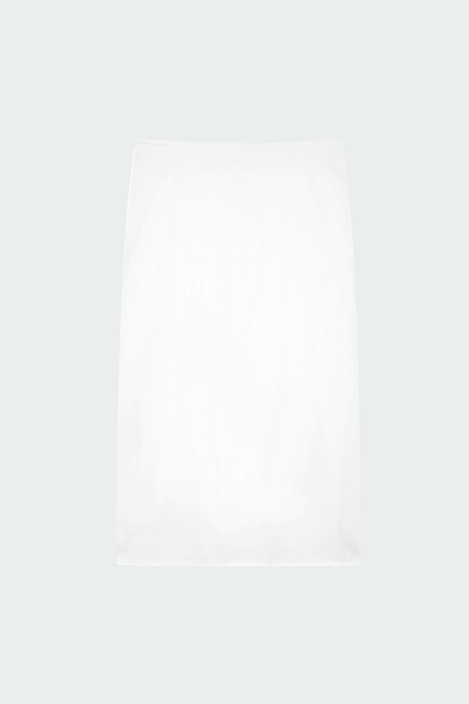 Amelia Skirt in white, a lightweight cotton midi skirt with inner drawstring waist, hidden side pockets, lined layers, raw-edge hem, and a center back slit for ease and movement