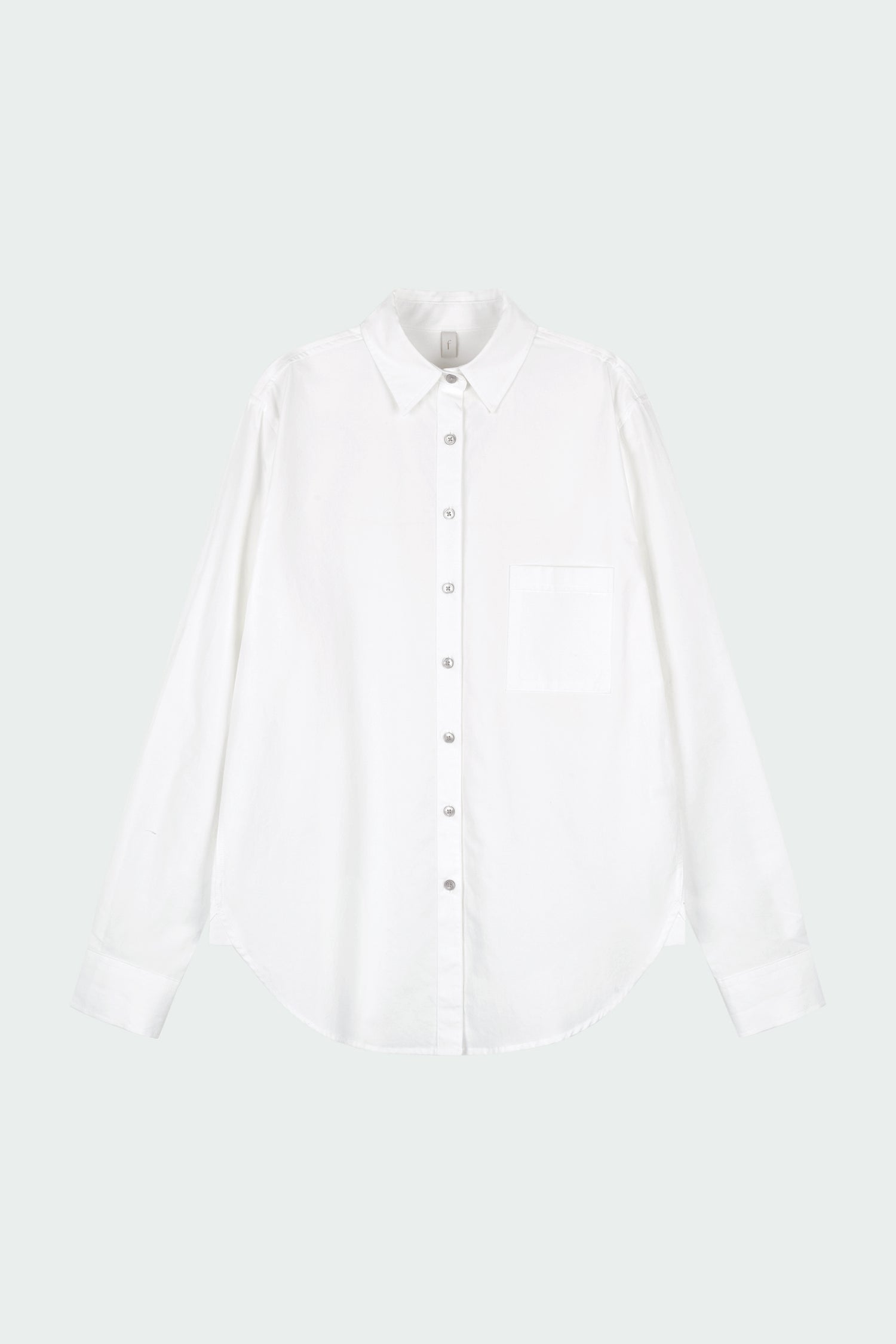 Isabella Shirt in white, a lightweight cotton-poly blend button-up with chest pocket, back pleat, and buttoned cuffs, designed in a regular fit with a hip-length silhouette