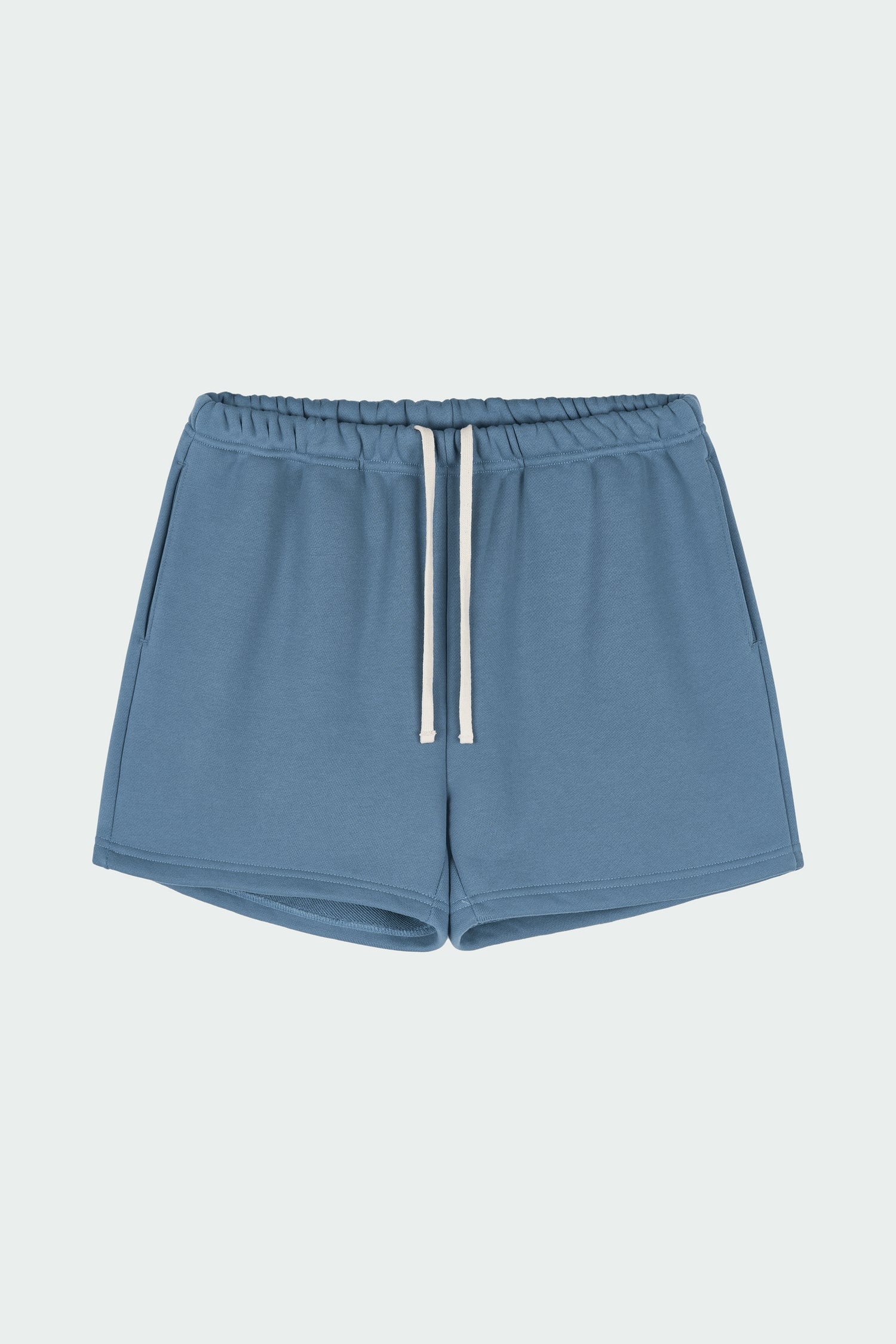 Kaia Shorts in indigo blue, mini-length cotton French terry shorts with an elasticated drawstring waist, side pockets, and back pocket, regular fit, part of a casual set