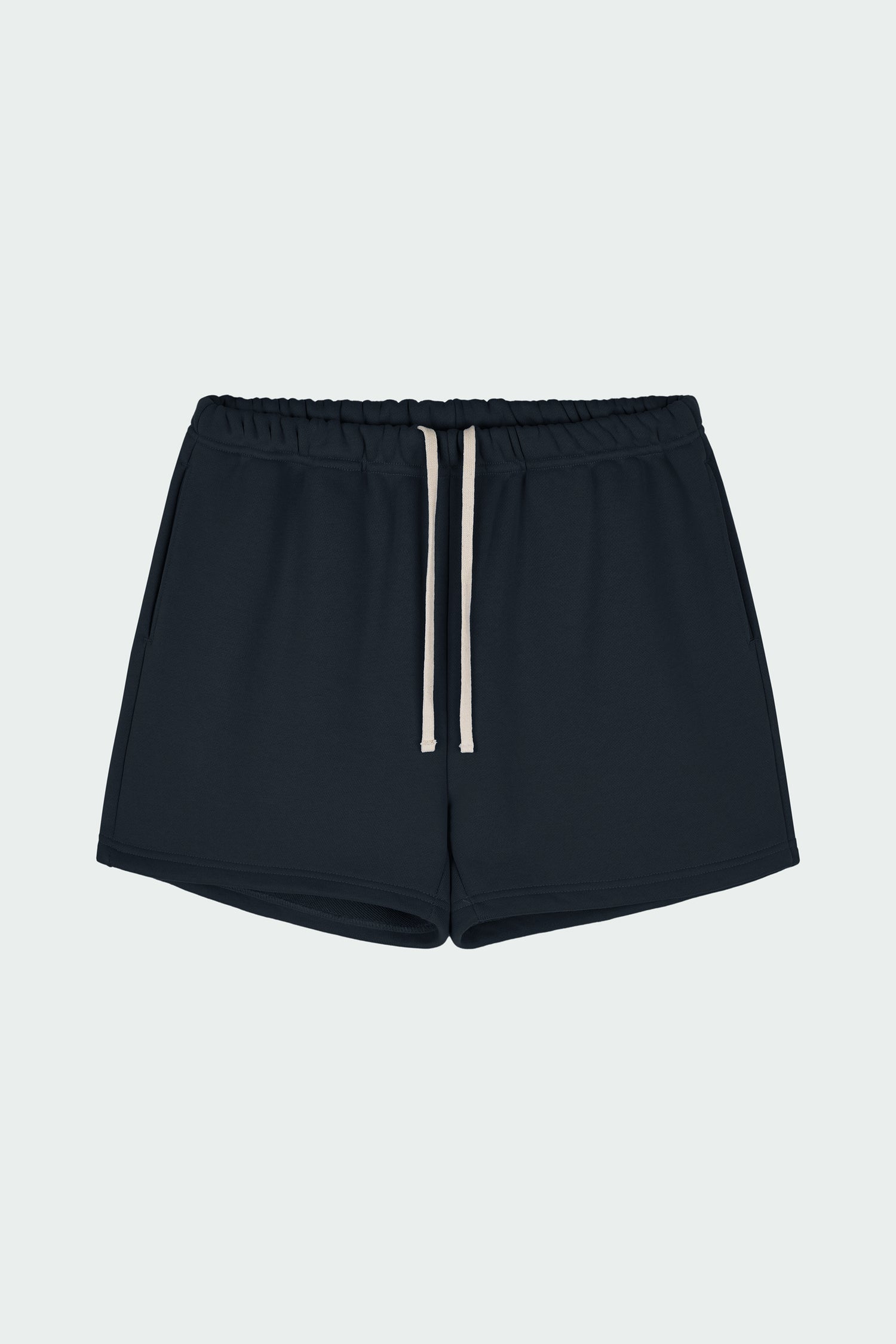 Kaia Shorts in navy, mini-length cotton French terry shorts with an elasticated drawstring waist, side pockets, and back pocket, regular fit, part of a casual set