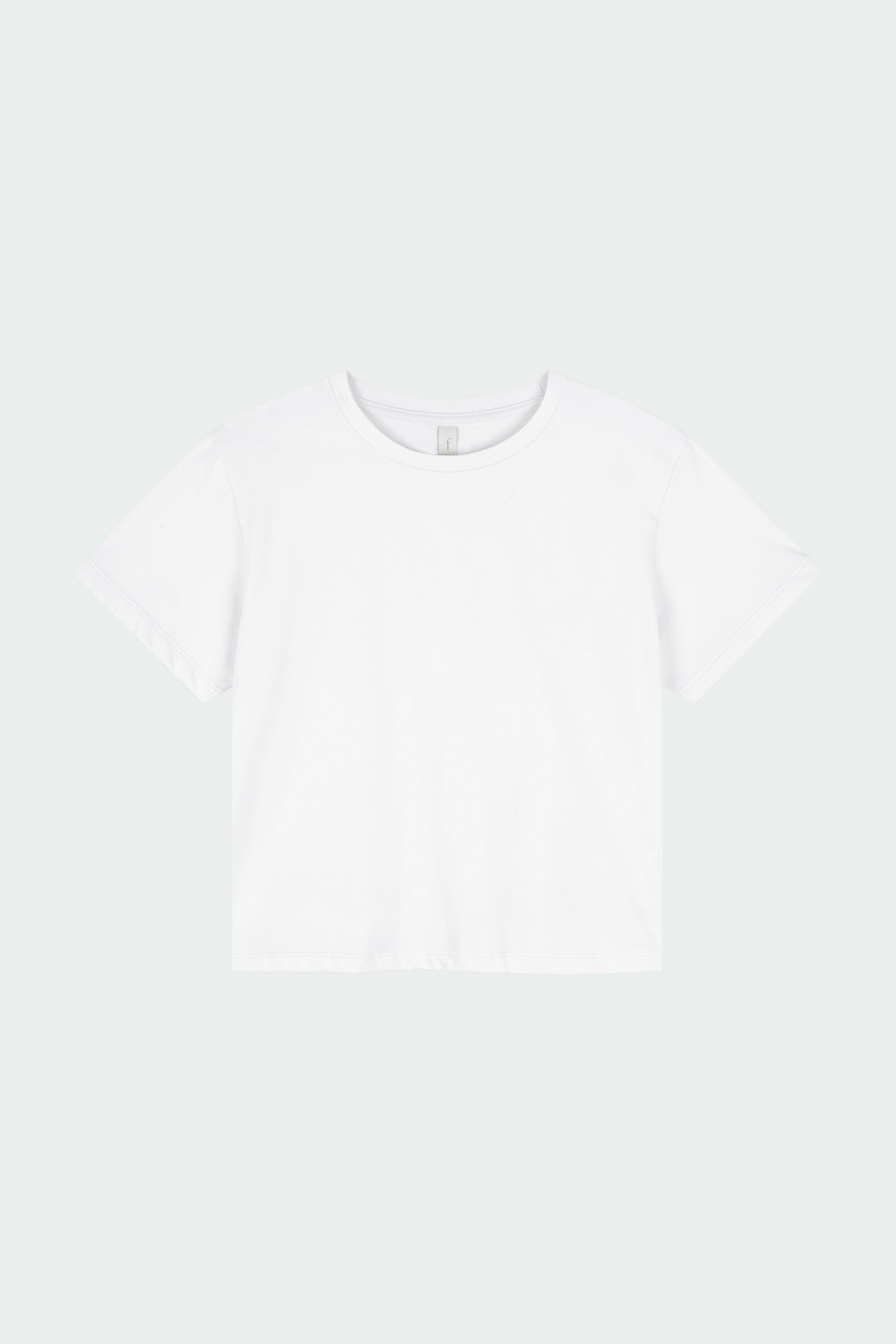 Ivy T-shirt in white, cropped short-sleeve tee in a lightweight cotton-poly blend with crew neck, regular fit, and clean silhouette.