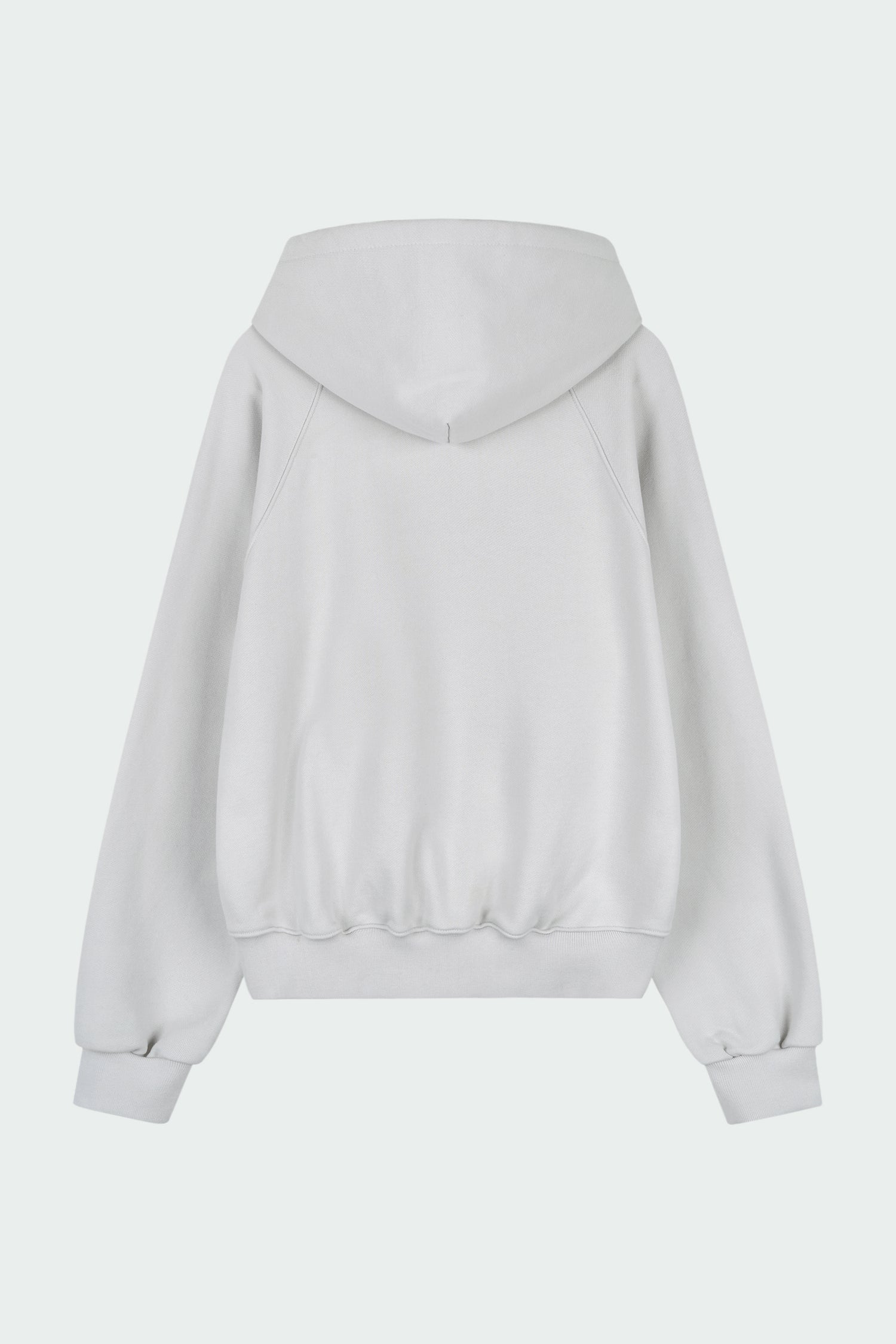 Kaia Hoodie in dune, oversized cotton French terry pullover with drawstring hood, raglan sleeves, kangaroo pocket, and ribbed trims.