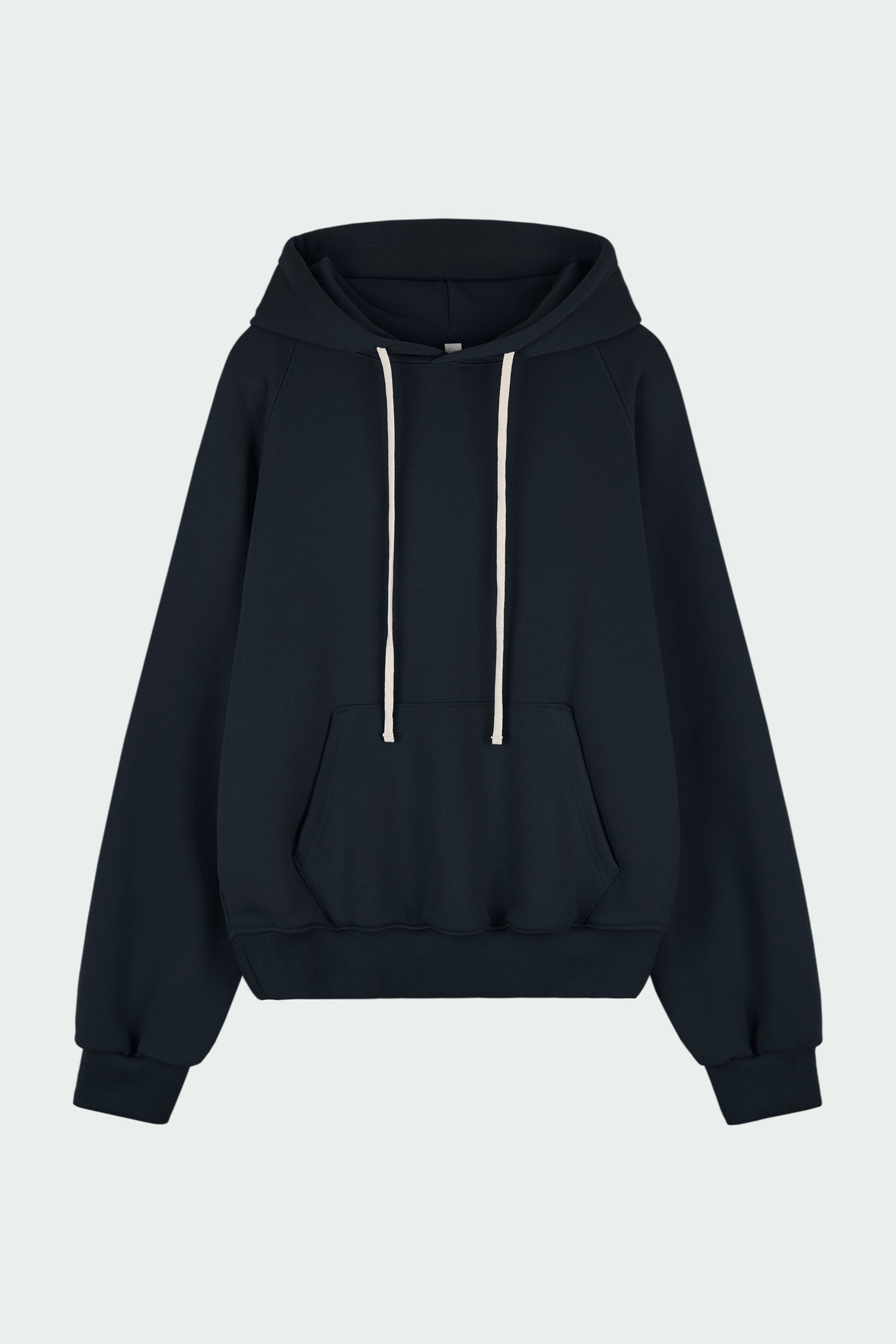 Kaia Hoodie in navy, oversized cotton French terry pullover with drawstring hood, raglan sleeves, kangaroo pocket, and ribbed trims.