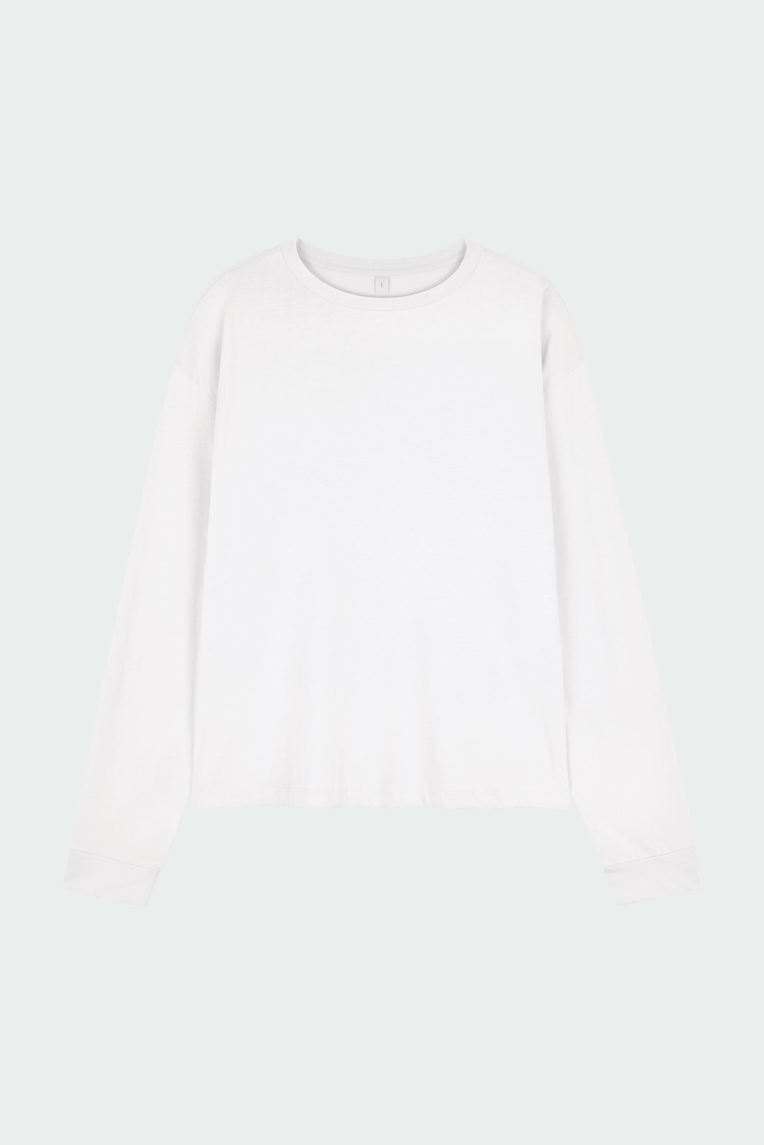 Lara Long-Sleeved T-Shirt in washed white, a lightweight cotton crew-neck tee with long sleeves and relaxed fit, ideal for everyday wear and seasonal layering