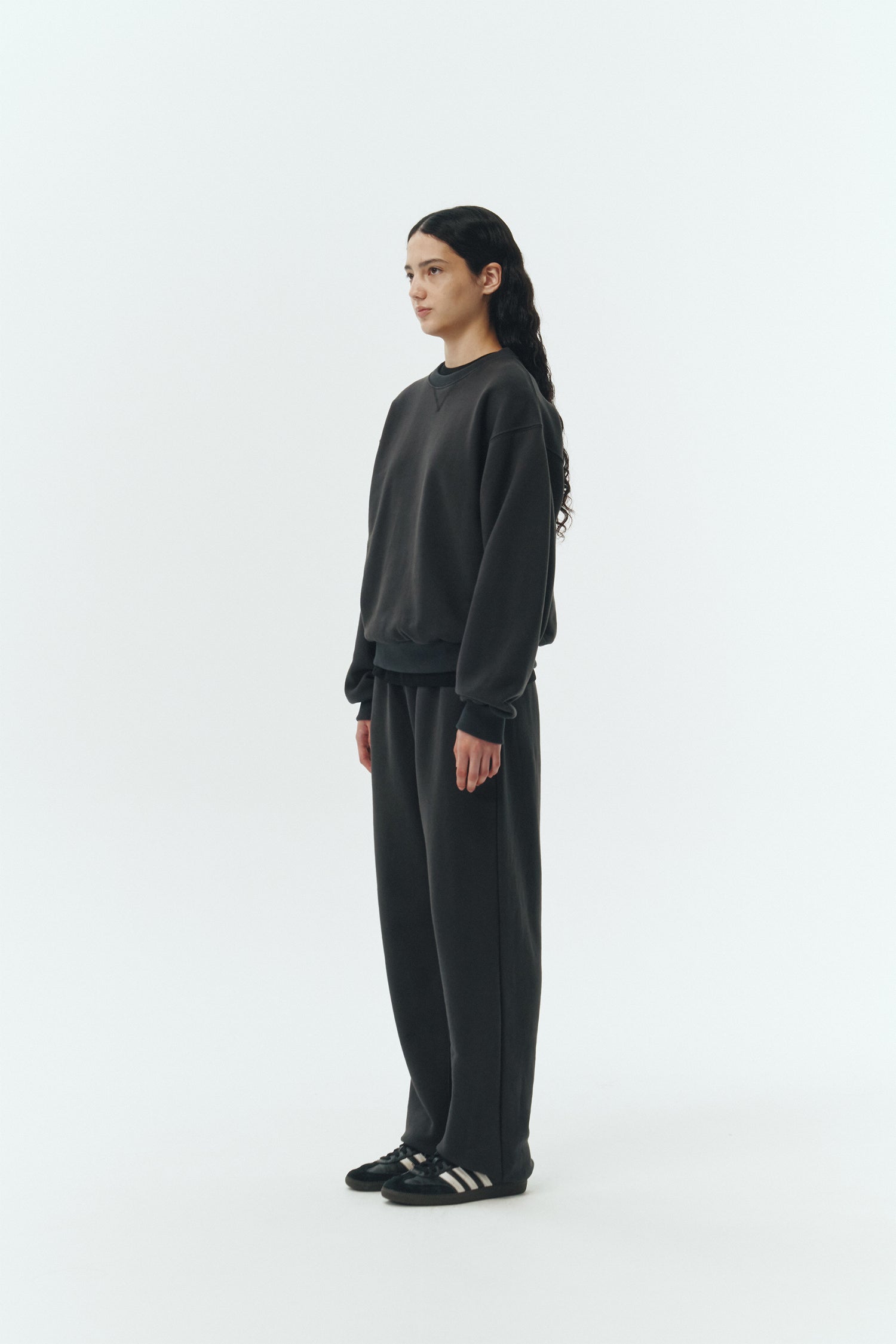 Willow Sweatshirt in ink black, a soft cotton French terry pullover with a crew neck, V-stitch detail, ribbed trims, and a relaxed fit, designed for everyday comfort