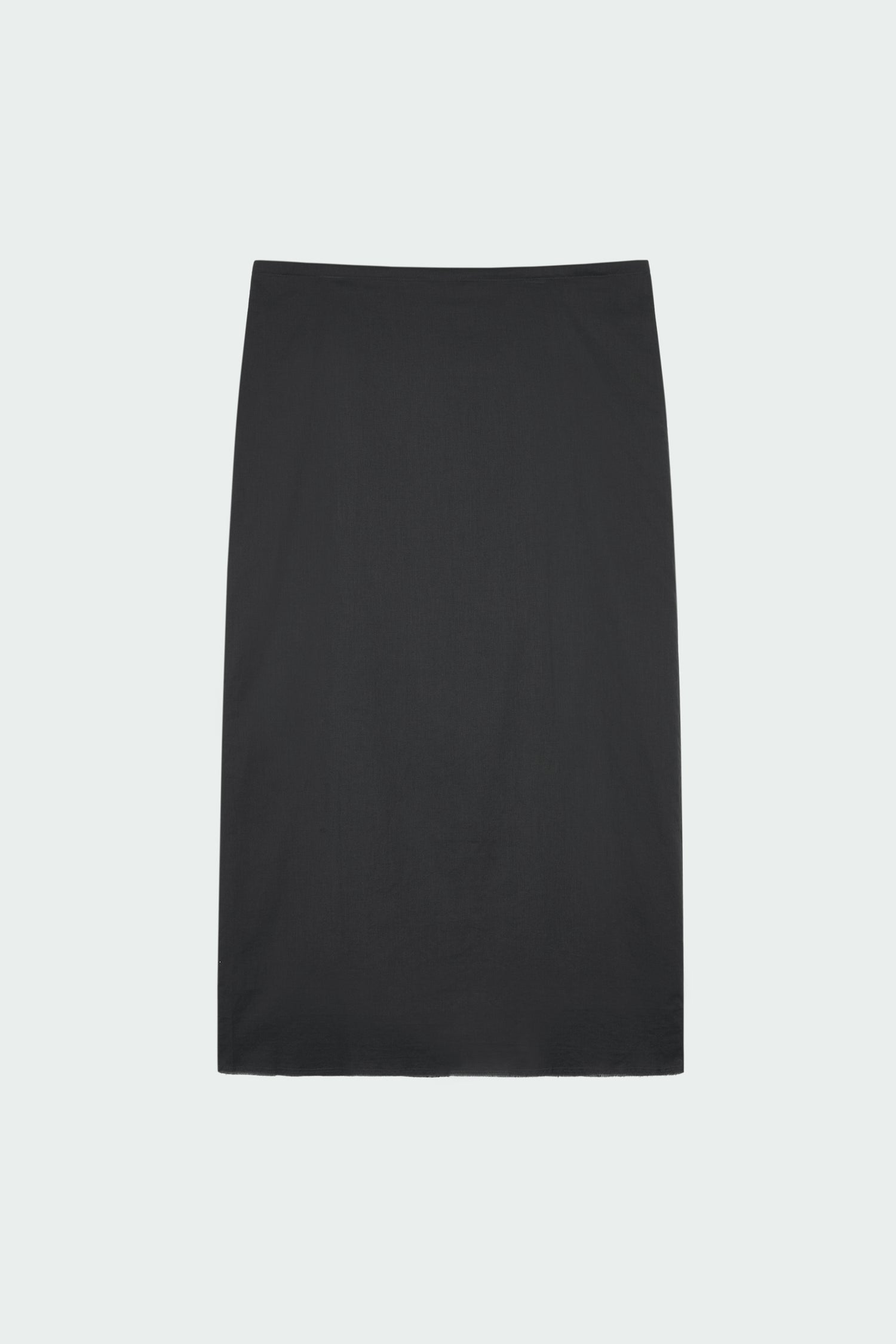 Amelia Skirt in charcoal, a lightweight cotton midi skirt with inner drawstring waist, hidden side pockets, lined layers, raw-edge hem, and a center back slit for ease and movement