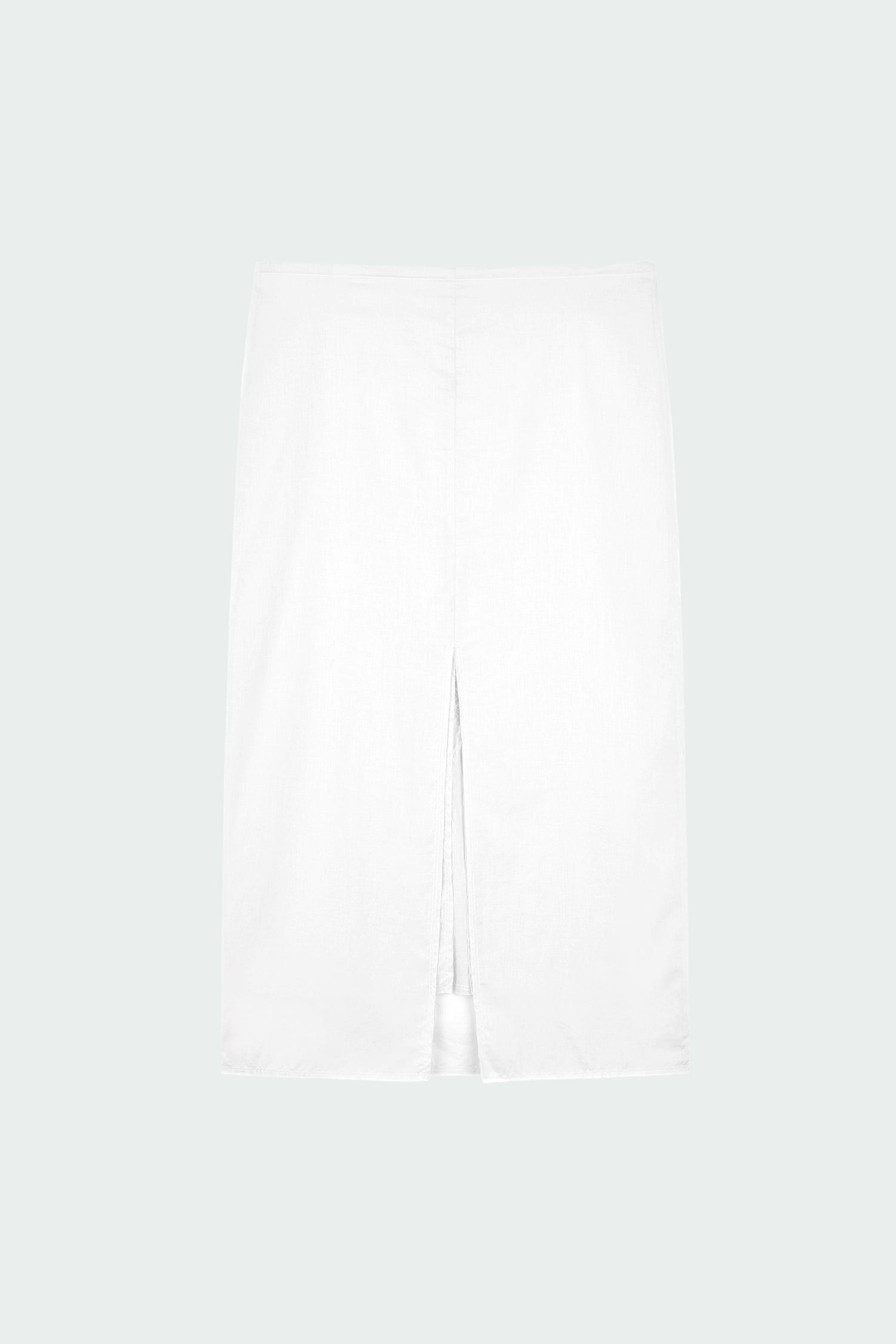 Amelia Skirt in white, a lightweight cotton midi skirt with inner drawstring waist, hidden side pockets, lined layers, raw-edge hem, and a center back slit for ease and movement