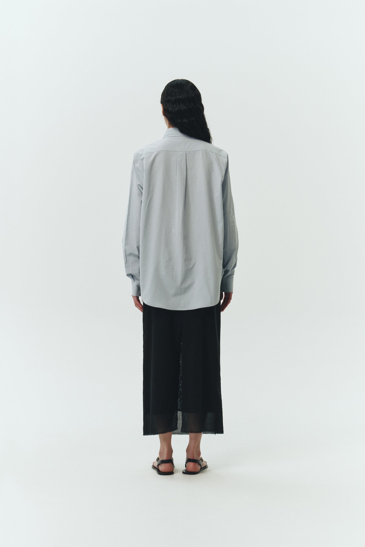 Isabella Shirt in sky, a lightweight cotton-poly blend button-up with chest pocket, back pleat, and buttoned cuffs, designed in a regular fit with a hip-length silhouette
