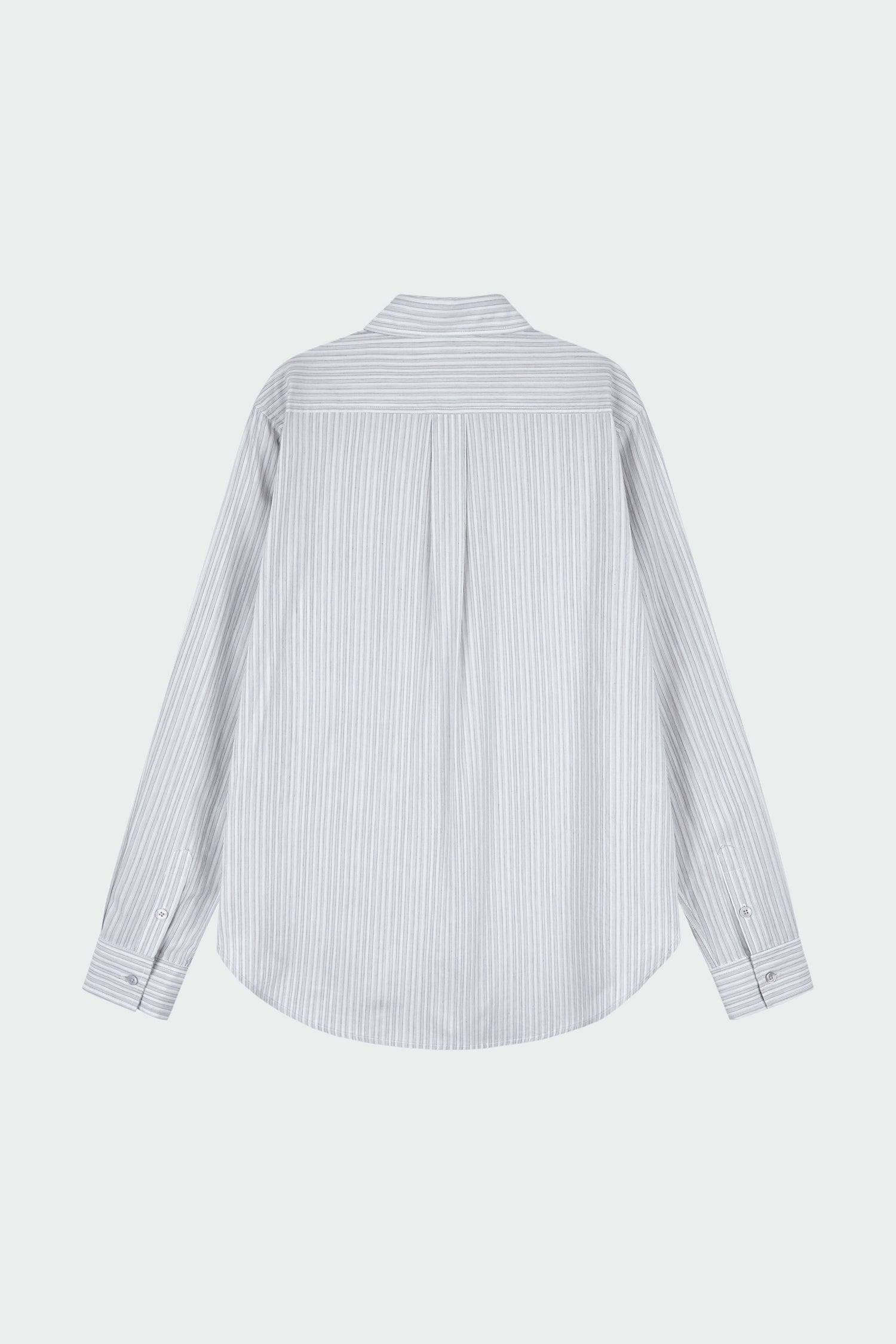 Isabella Shirt in stripe, a lightweight cotton-poly blend button-up with chest pocket, back pleat, and buttoned cuffs, designed in a regular fit with a hip-length silhouette