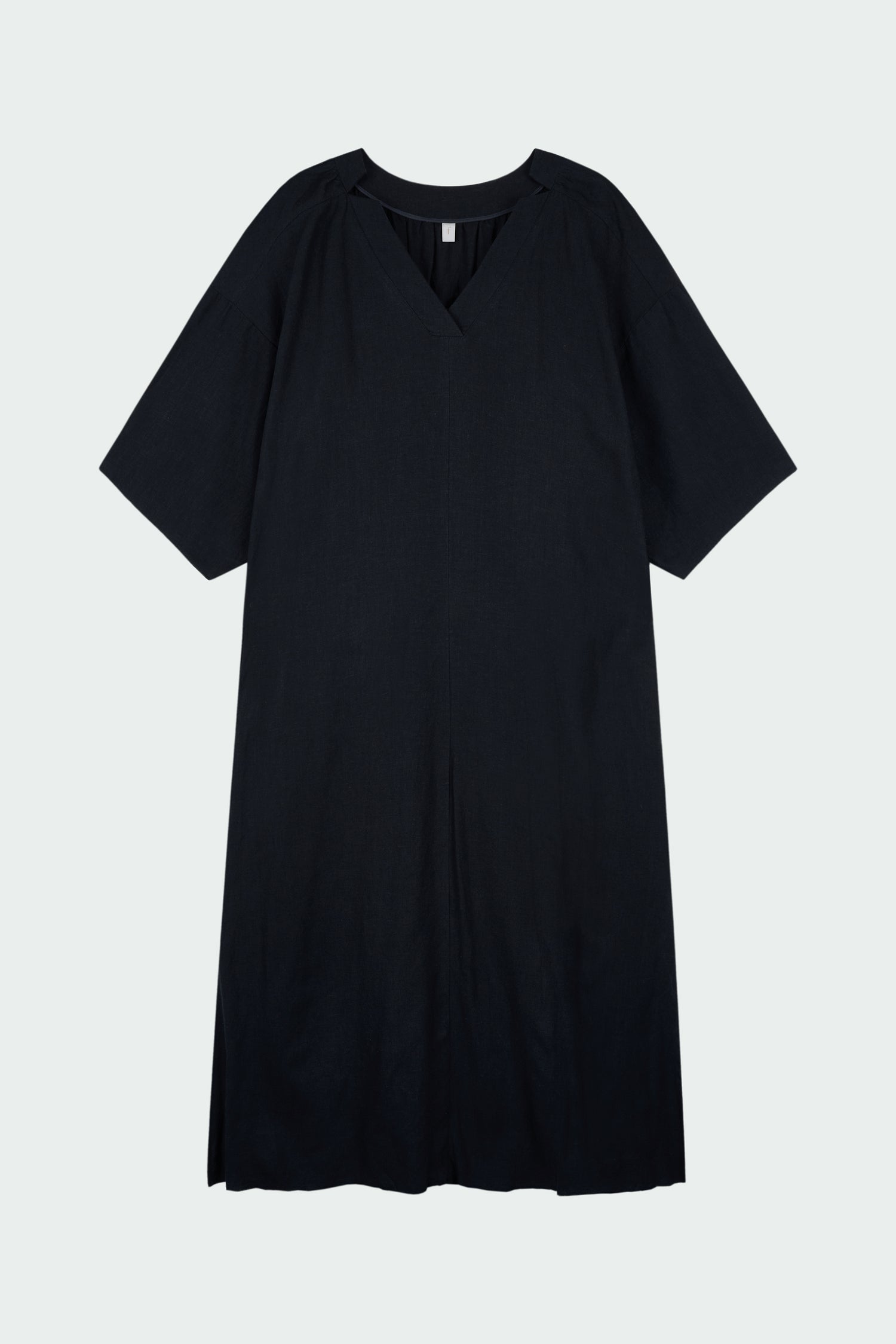 Charlotte Dress in navy, V-neck summer maxi dress in a lightweight linen-rayon blend with drop shoulders, hidden side pockets, raw edge hem, and a relaxed fit.