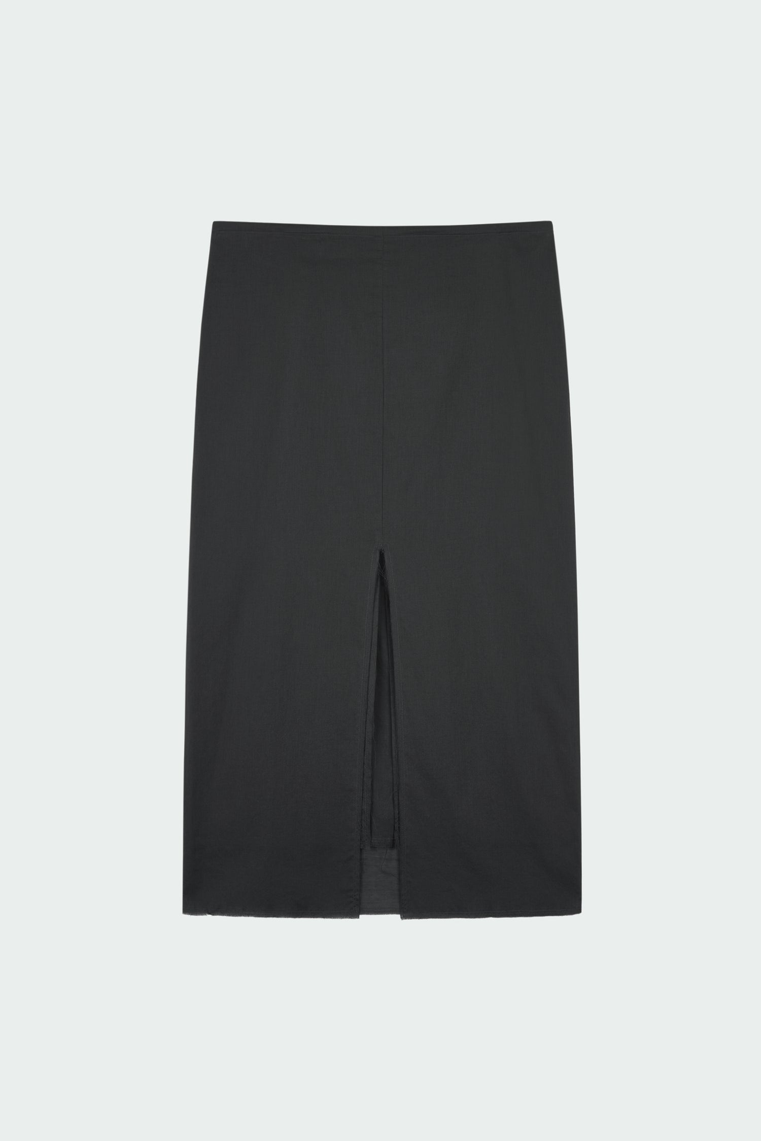 Amelia Skirt in charcoal, a lightweight cotton midi skirt with inner drawstring waist, hidden side pockets, lined layers, raw-edge hem, and a center back slit for ease and movement