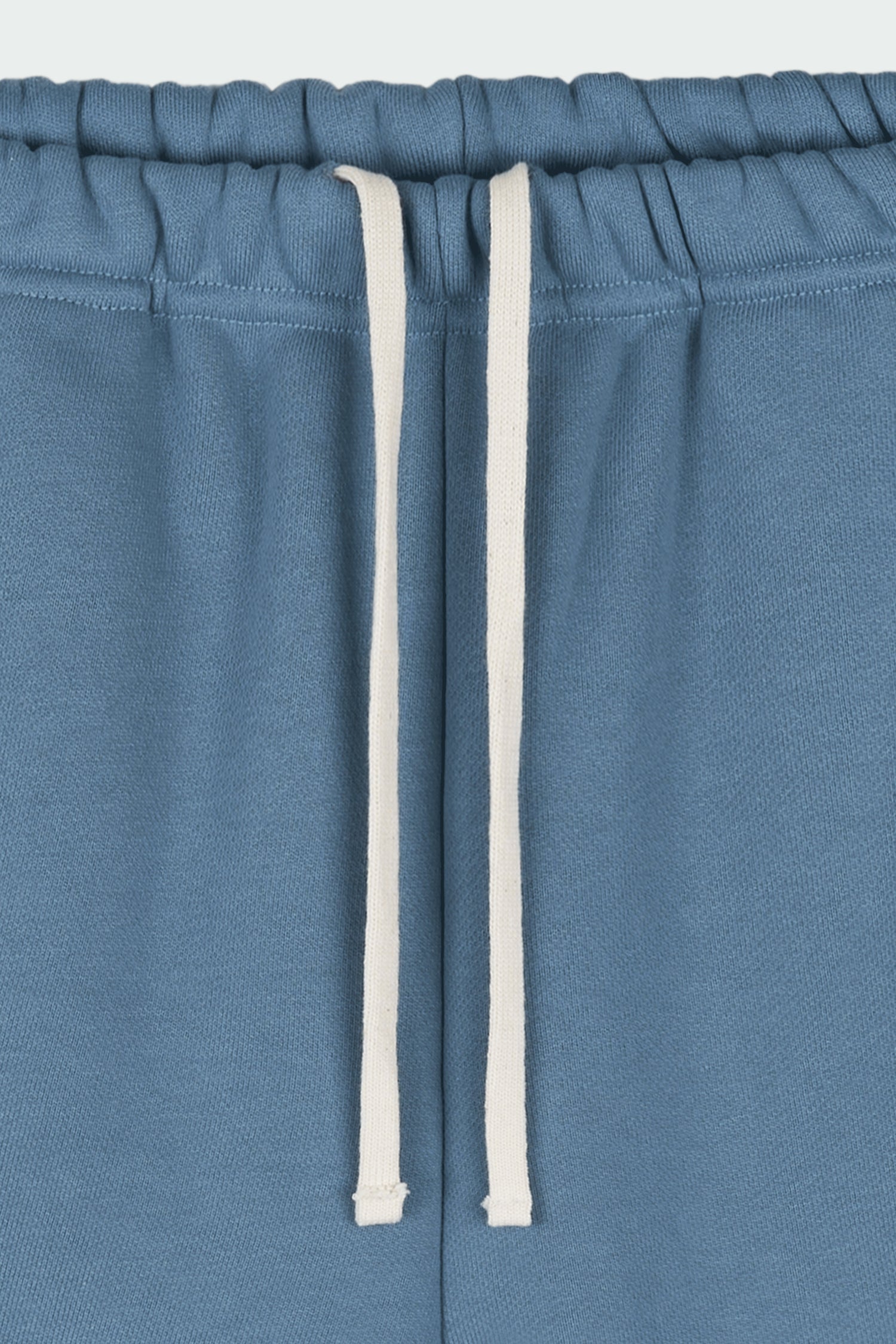 Kaia Shorts in indigo blue, mini-length cotton French terry shorts with an elasticated drawstring waist, side pockets, and back pocket, regular fit, part of a casual set