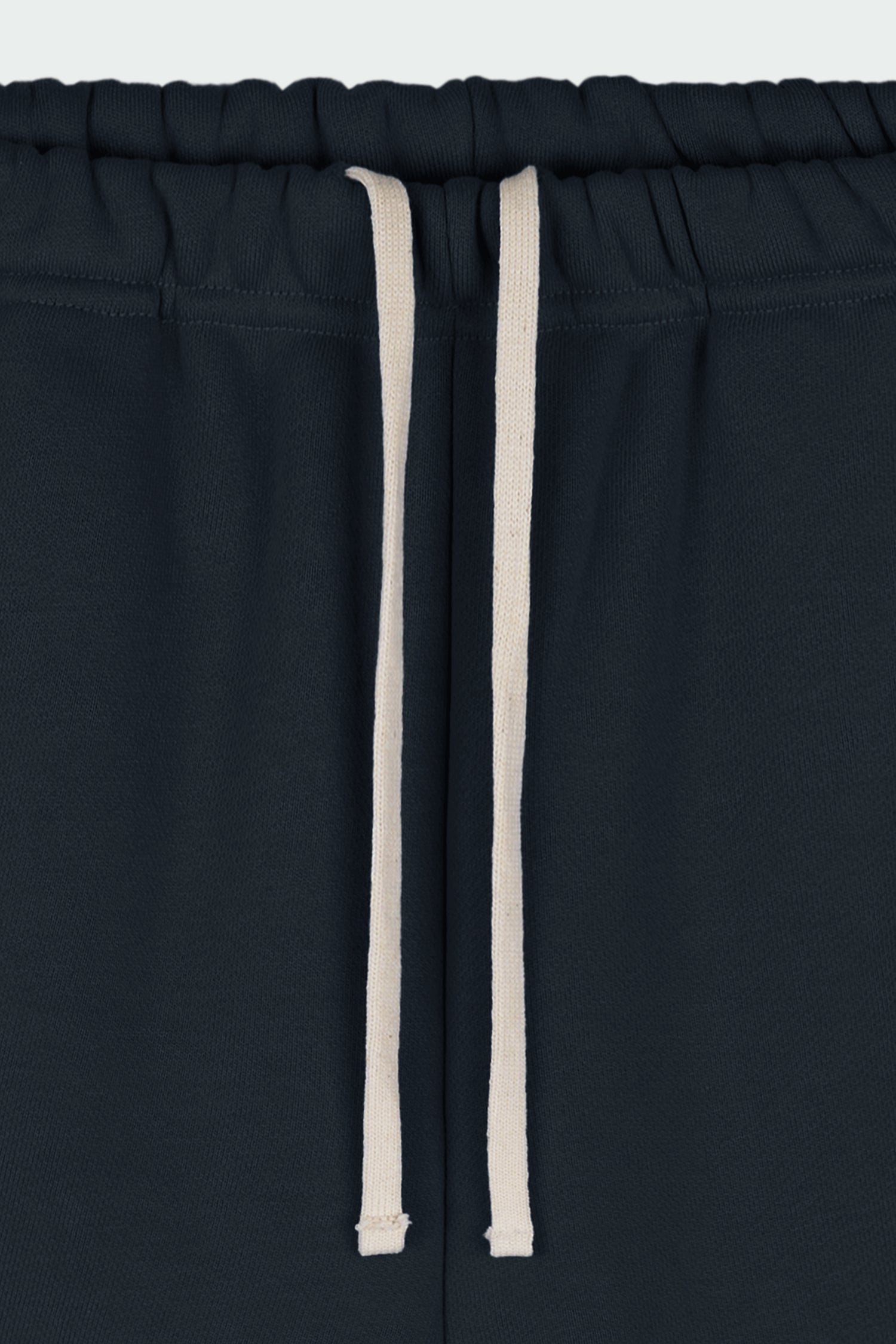 Kaia Shorts in navy, mini-length cotton French terry shorts with an elasticated drawstring waist, side pockets, and back pocket, regular fit, part of a casual set